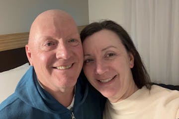 John and Stephanie DeVos reunited in Minneapolis after a plane crash in Toronto on Monday. John DeVos of Marshall, Minn., was onboard Delta Connection