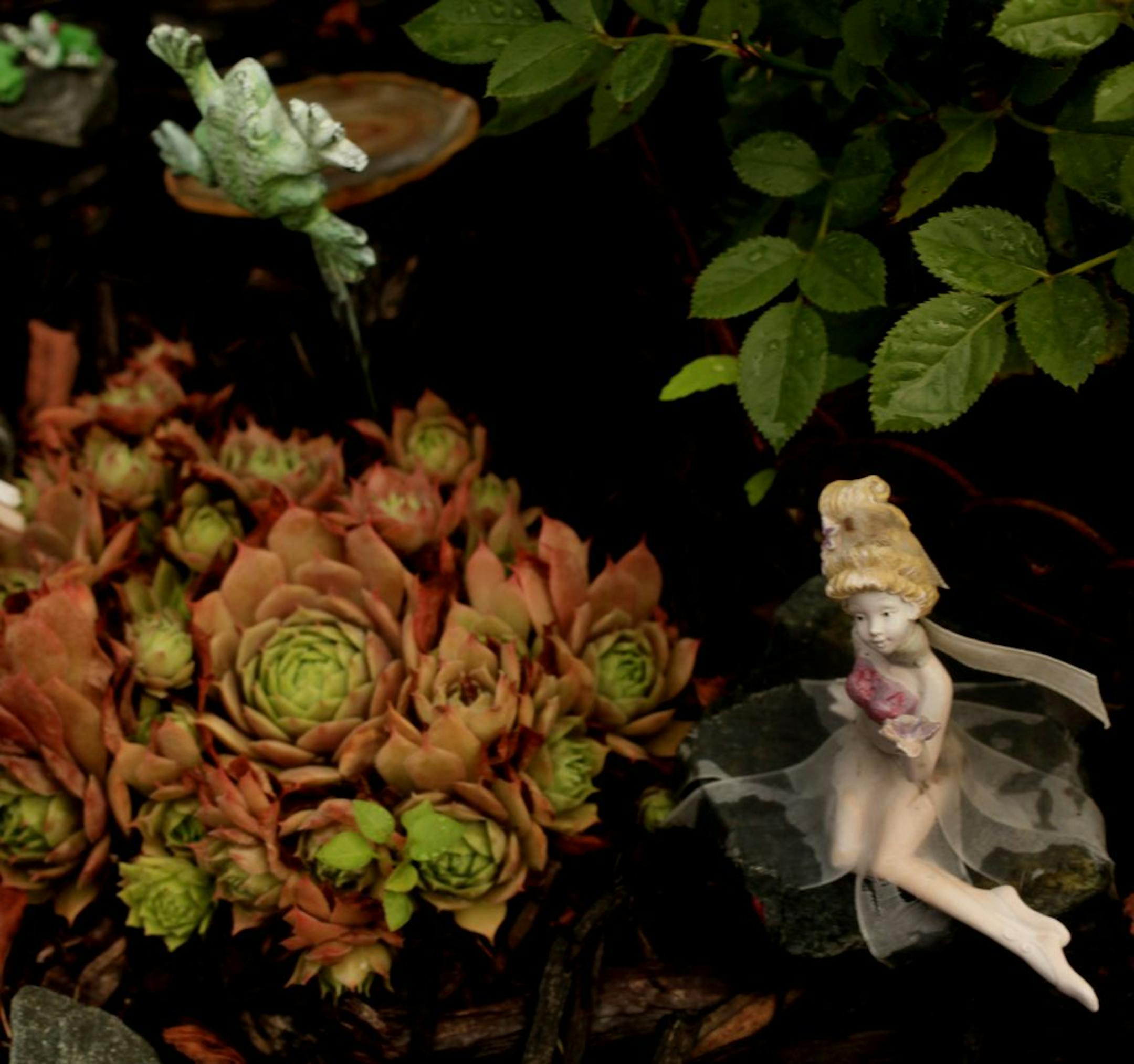 A detail from Bob and Enid Erickson's fairy garden in Bloomington.