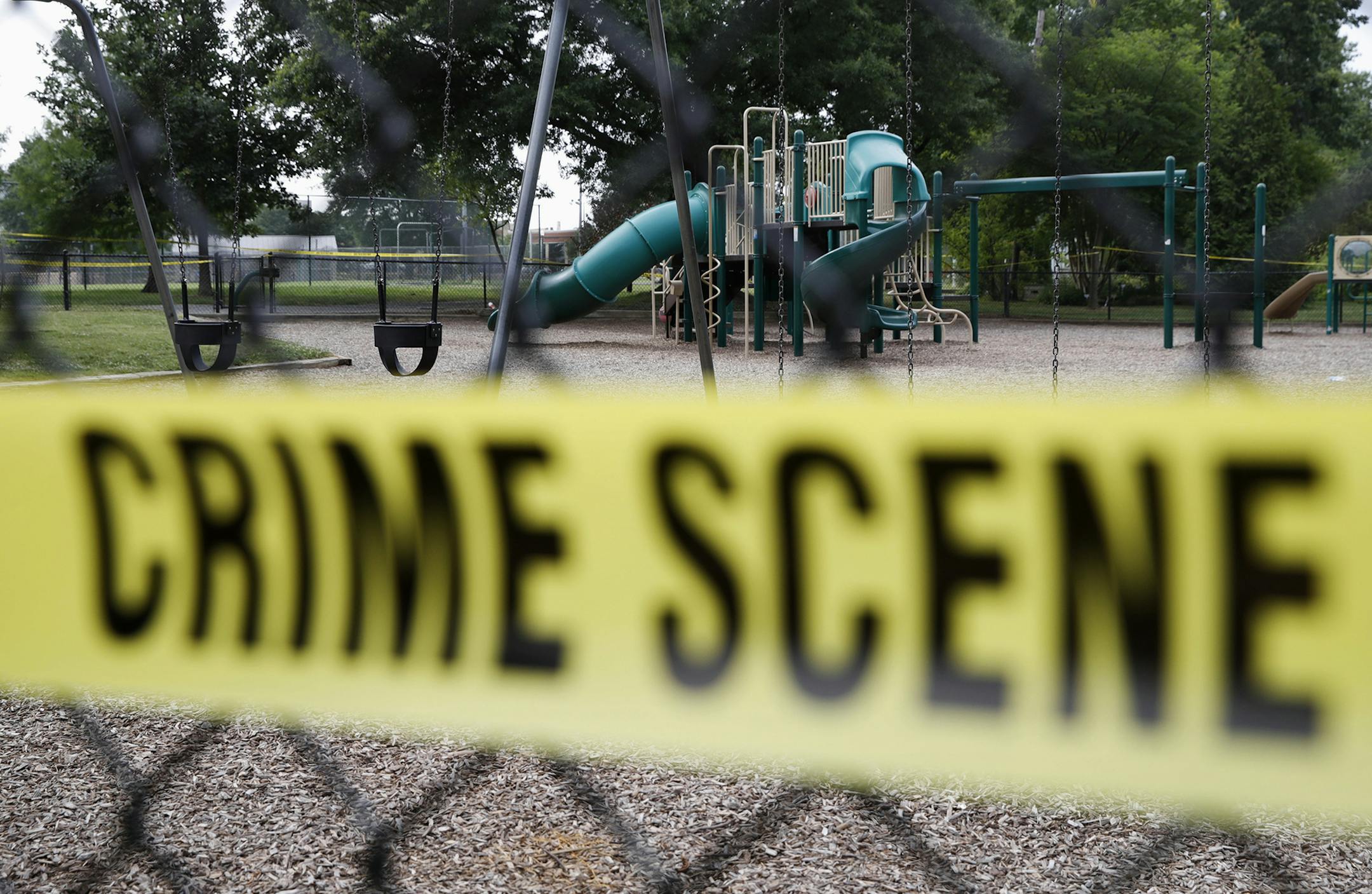 A playground near the baseball field is cordoned off with police tape as the investigation continue at the scene in Alexandria, Va., Thursday, June 15, 2017, the day after House Majority Whip Steve Scalise of La. was shot during during a congressional baseball practice. (AP Photo/Jacquelyn Martin) ORG XMIT: MIN2017061513504849