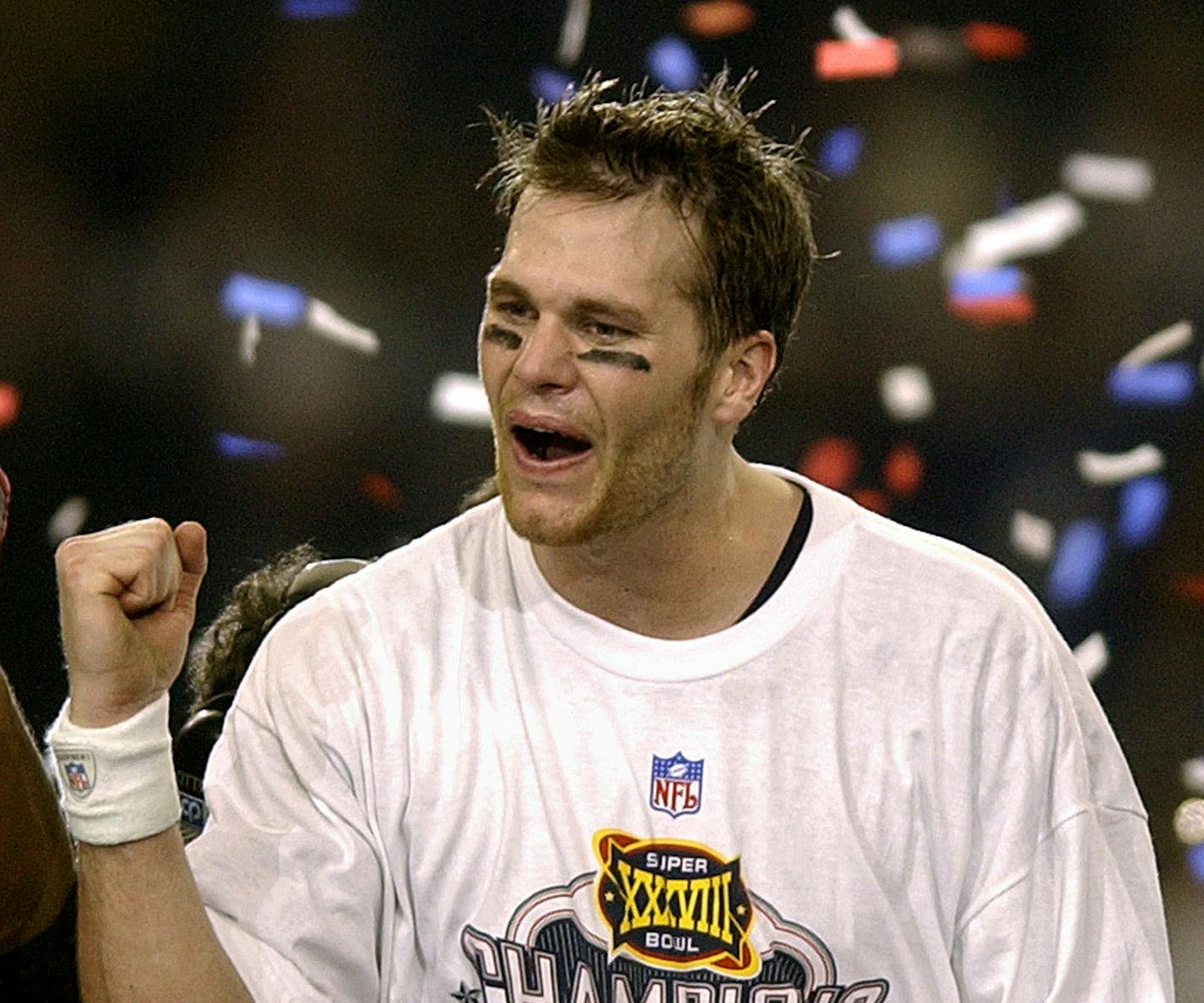 New England Patriots quarterback Tom Brady celebrates his team's 32-29 victory over the Carolina Panthers in Super Bowl XXXVIII in Houston, Sunday, Feb. 1, 2004. (AP Photo/Elise Amendola)