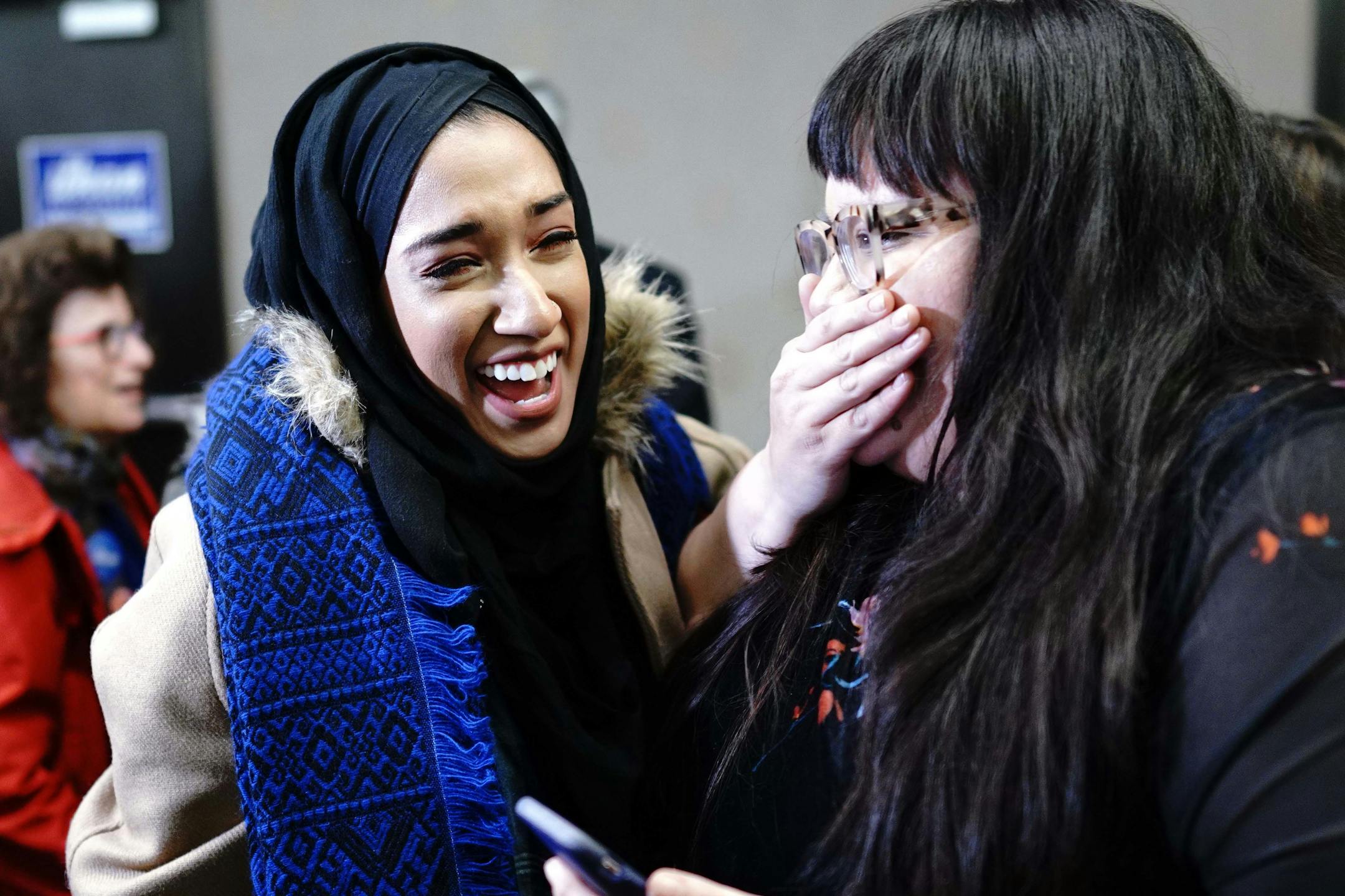 Asma Mohammed and Ashley Fairbanks celebrate as results come in. ] MARK VANCLEAVE ï mark.vancleave@startribune.com * Ilhan Omar is poised to become the first Somali-American elected to Congress, representing Minnesota's Fifth District. Photographed at her election night headquarters in Minneapolis on Tuesday, Nov. 6, 2018.