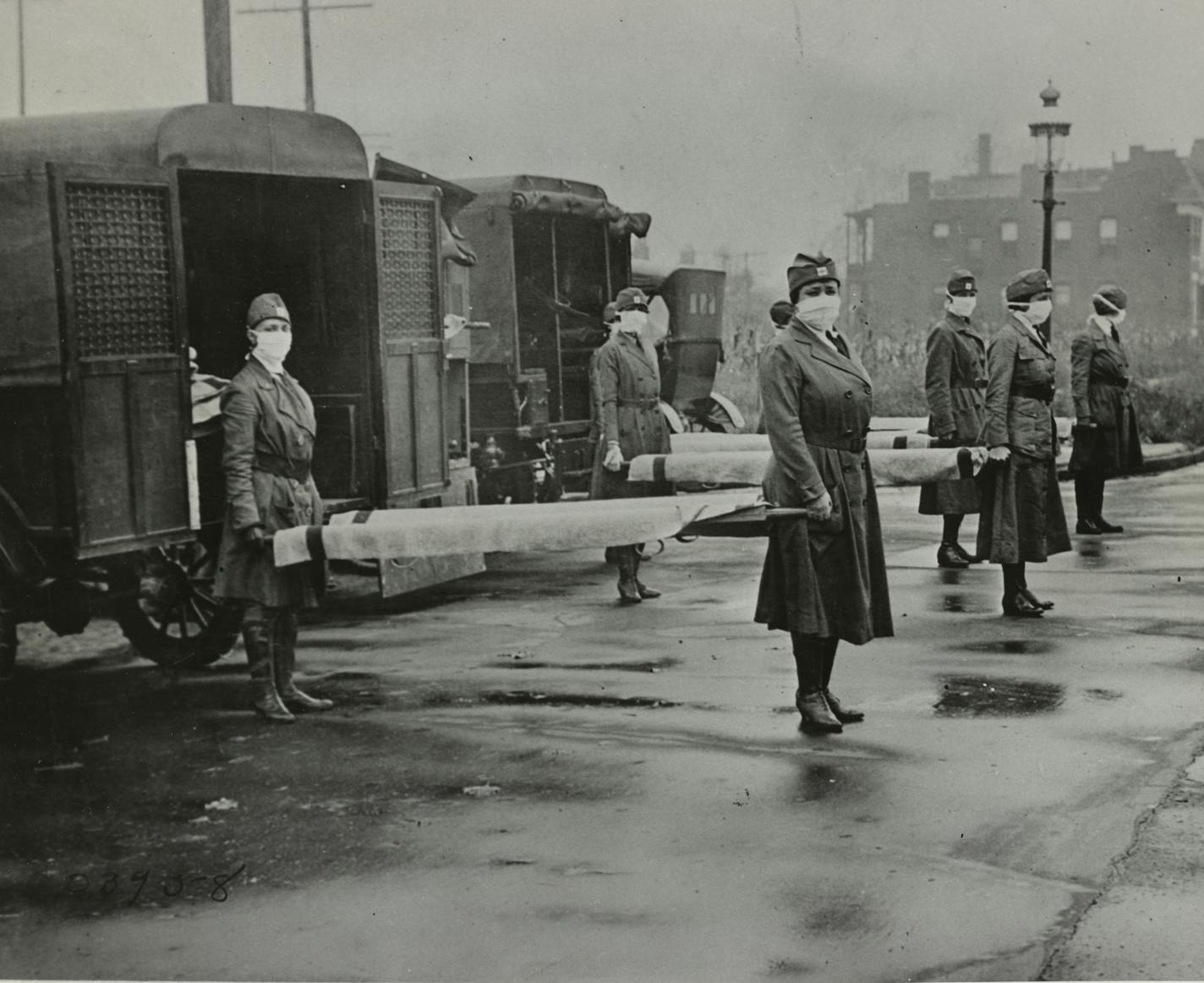 In an archival photo, Members of the Red Cross were on duty to receive people effected by the flu in St. Louis in October 1918. The 1918 pandemic coincided with midterm elections, where voters decided if the Democrat, President Woodrow Wilson's party, would retain control of Congress; keeping polling places open became a patchwork of decisions by local officials. (Library of Congress via The New York Times) -- FOR EDITORIAL USE ONLY --