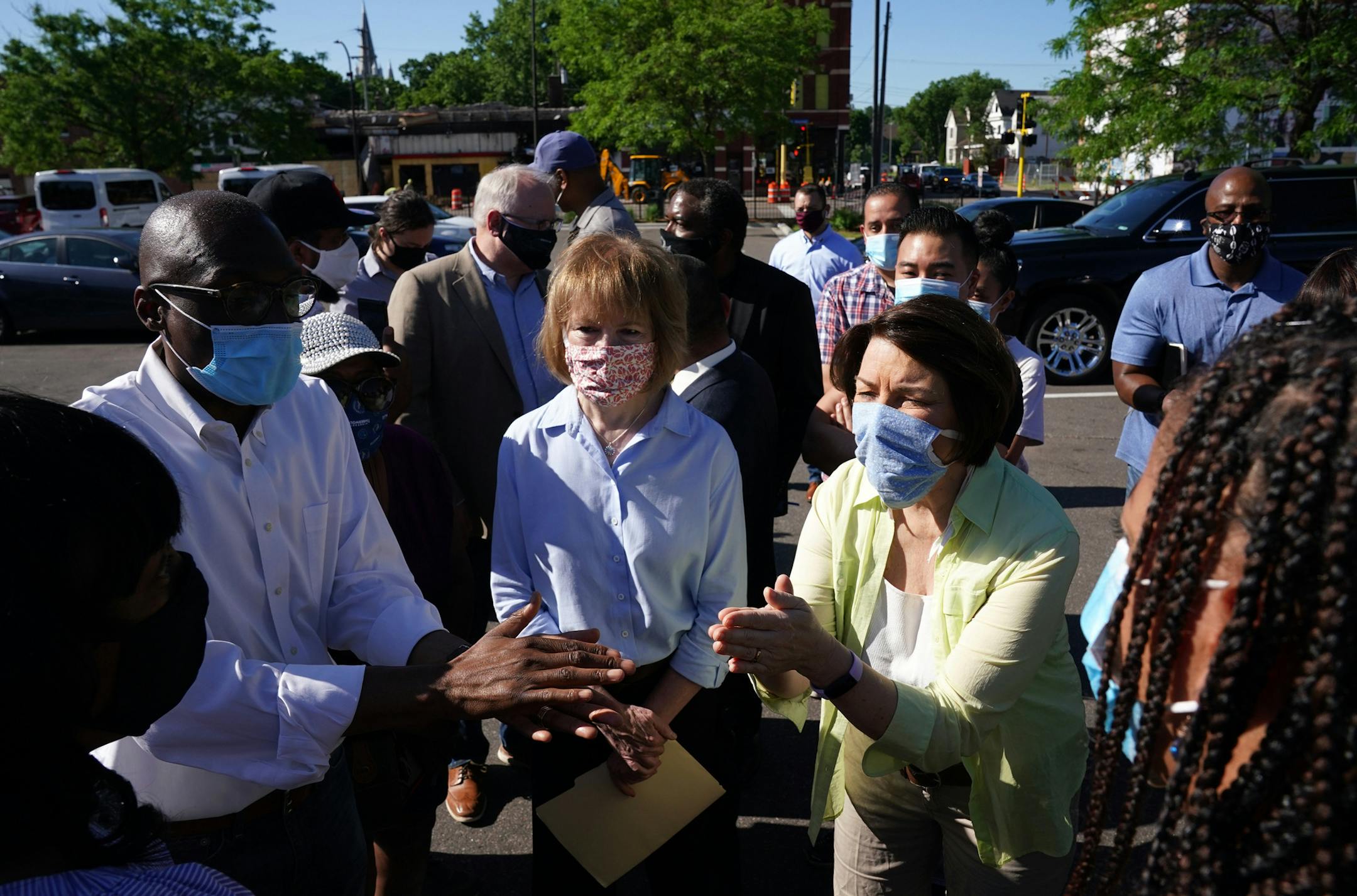 Gov. Tim Walz, Sen. Amy Klobuchar, and Sen. Tina Smith met with business owners that were affected by the looting and riots following the George Floyd protests Friday morning at Hawthorne Crossings on West Broadway Avenue in north Minneapolis. ] ANTHONY SOUFFLE • anthony.souffle@startribune.com Gov. Tim Walz went for a haircut at Capitol Barbers then toured some of the sites where looting and vandalism occurred during the George Floyd protests and riots Friday, June 5, 2020 in Minneapolis.