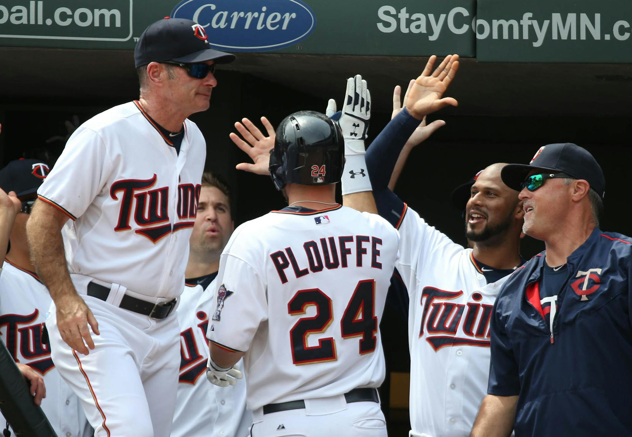 Twinsí Trevor Plouffe (#24) celebrated with teammates after hitting a home run in the 2nd inning. ] JIM GEHRZ ï james.gehrz@startribune.com / Minneapolis, MN / August 13, 2015 / 12:00 PM ñ BACKGROUND INFORMATION: The Minnesota twins played the Texas Rangers at Target Field Thursday afternoon.