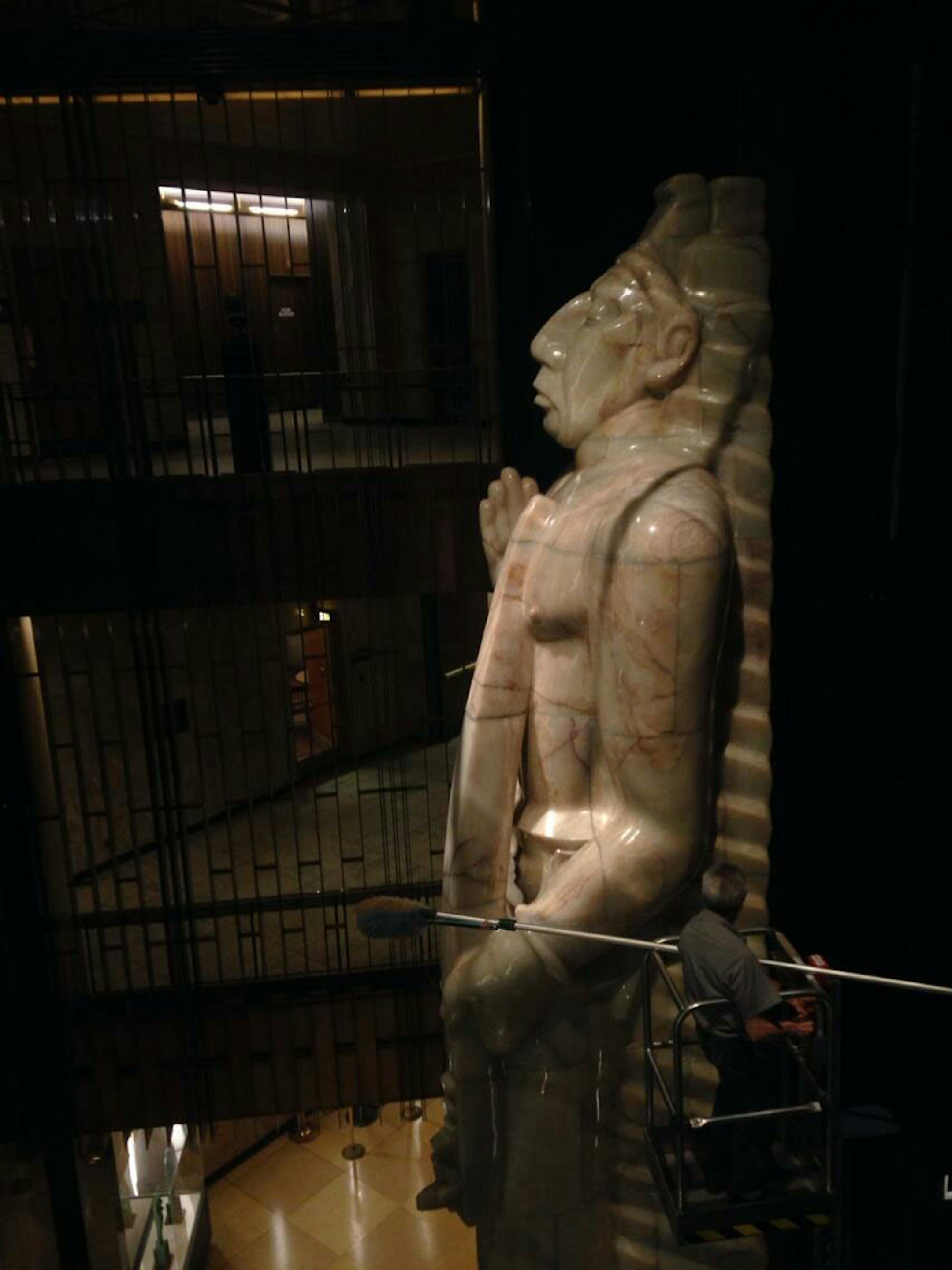 The 36-foot tall statue in the Ramsey County courthouse gets a cleaning.