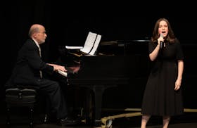 With Philip Brunelle on the piano, Lillian Hochman sang "Tomorrow" from the musical "Annie" during a memorial service Sunday for former Vice President