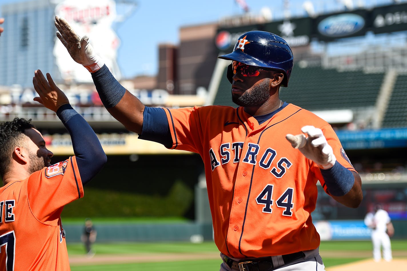 Houston Astros left fielder Yordan Alvarez celebrates after hitting a two-run home run against Minnesota Twins pitcher Josh Winder during the first third of a baseball game, Thursday, May 12, 2022, in Minneapolis. (AP Photo/Craig Lassig)