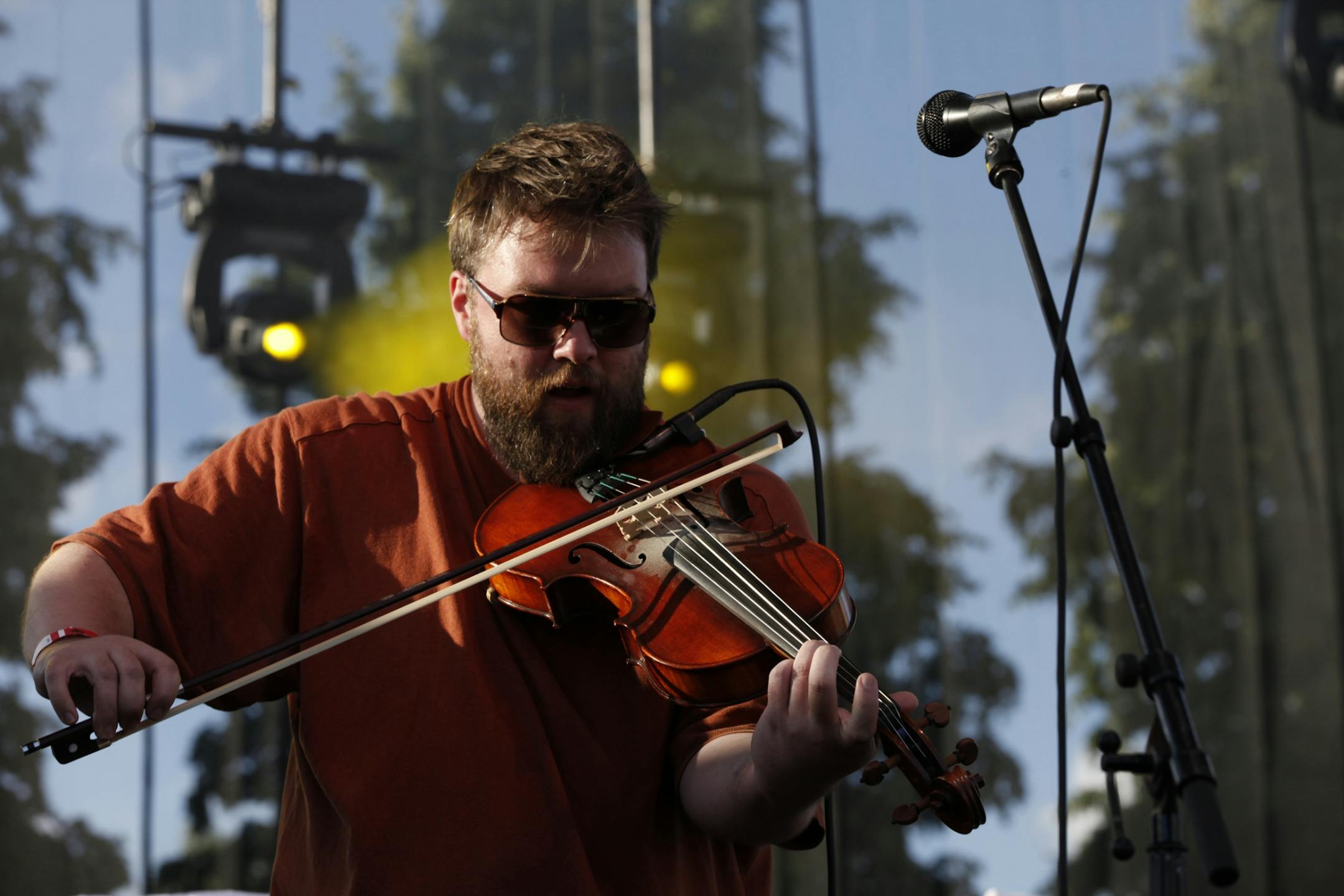Trampled by Turtles's Ryan Young performs as the fourth act of the evening at the 2012 Rock the Garden concert in Minneapolis, Minn. on Saturday, June 16, 2012.