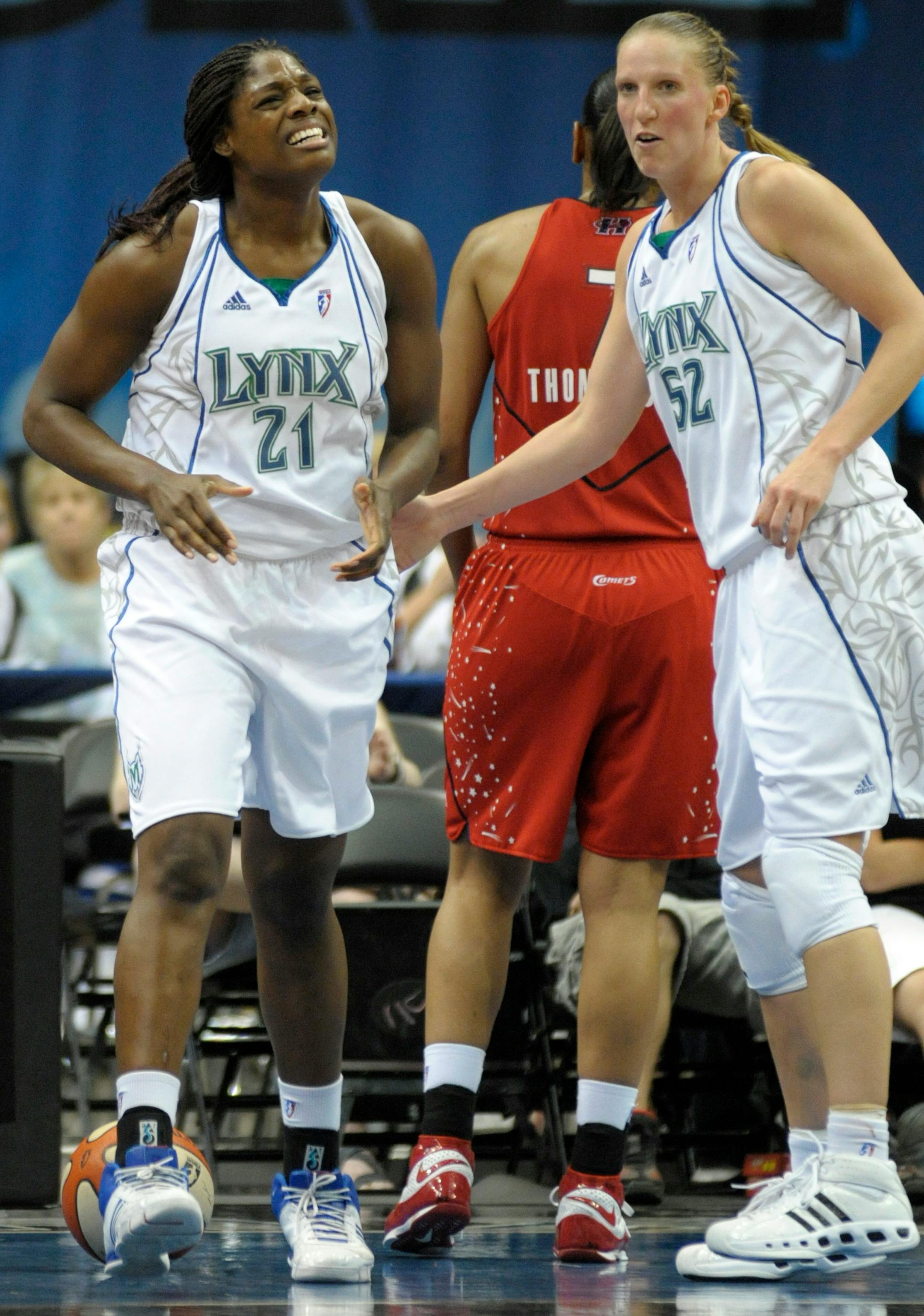 Minnesota Lynx's Nicky Anosike, left, reacts after the Lynx lose to the Houston Comets 72-65 during a WNBA basketball game, Saturday, June 21, 2008 in Minneapolis. (AP Photo/ A.J. Olmscheid)
