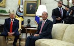 President Donald Trump listens as Secretary of Health and Human Services Alex Azar talks about a plan to ban most flavored e-cigarettes, in the Oval O