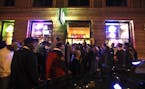Customers line up outside Pizza Luce in downtown Minneapolis after the bars close in this 2011 file photo.