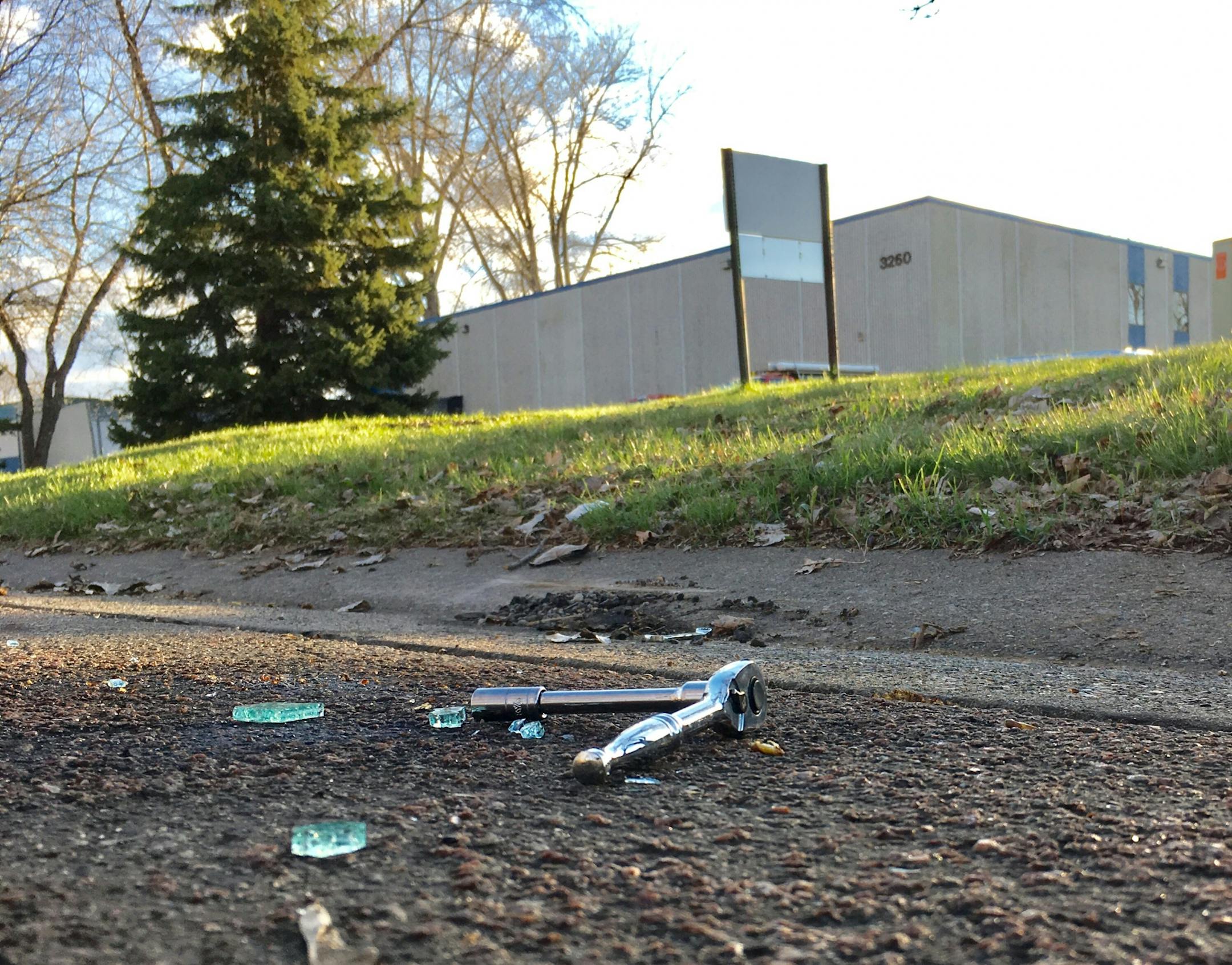 Tools and glass are all that remain at the scene where a man died in an officer-involved near an industrial site in Vadnais Heights, near Hwy 61 and 694.