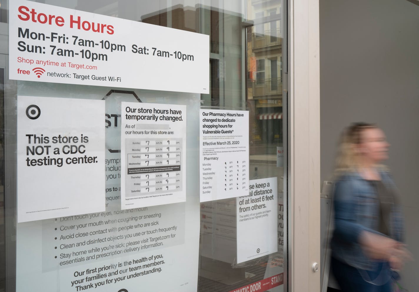 A sign at the entrance to the Uptown Target store declares that it is not a CDC testing center.