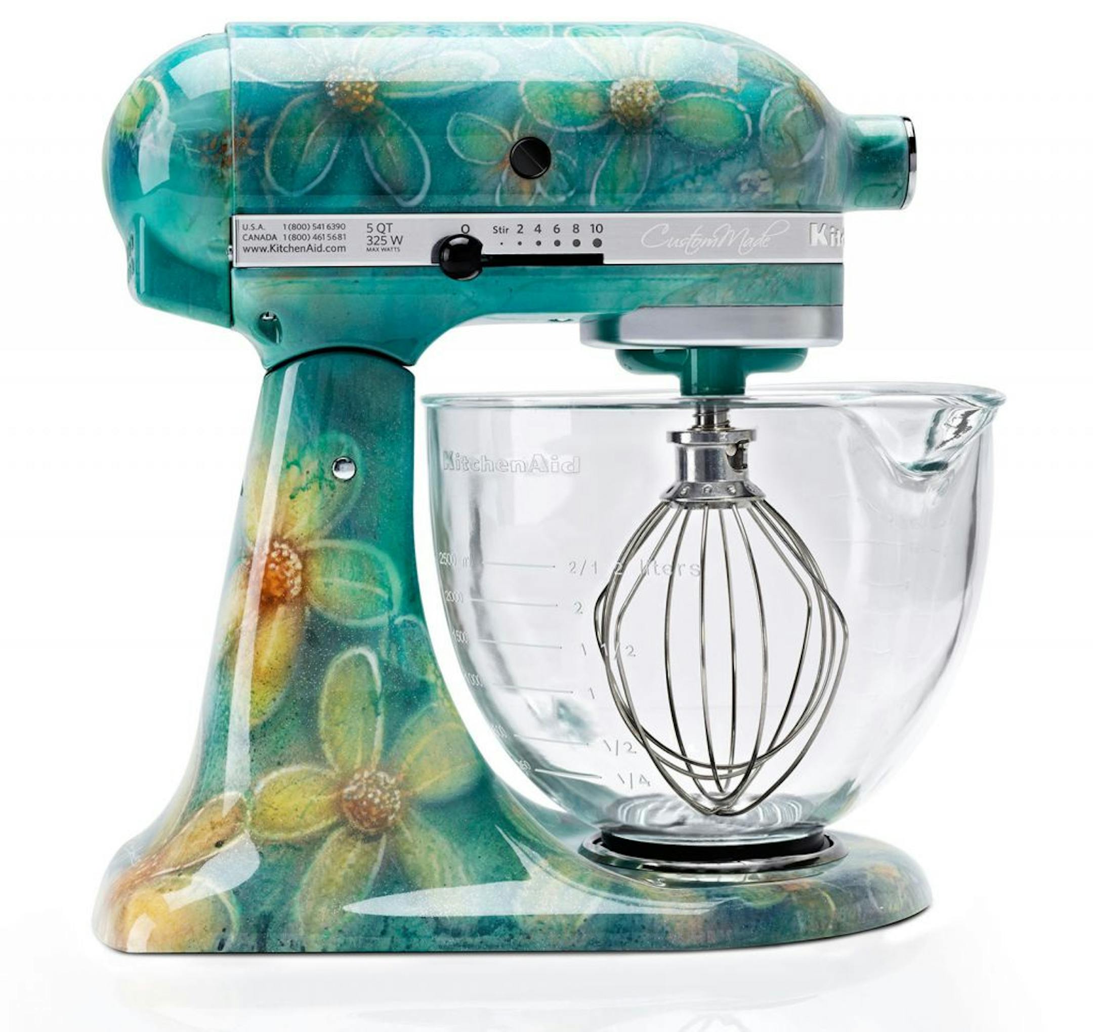 KitchenAid will offer hand-painted, limited editions of its iconic stand mixer for the holiday season. The six original designs include Leopard, Snow Leopard and Noir Leopard; a zebra-striped Serengeti model; a floral-inspired Golden Petals design; and Shimmer(pictured), featuring the artist's signature blue flowers. To order please visit http://www.shopkitchenaid.com/custommade.