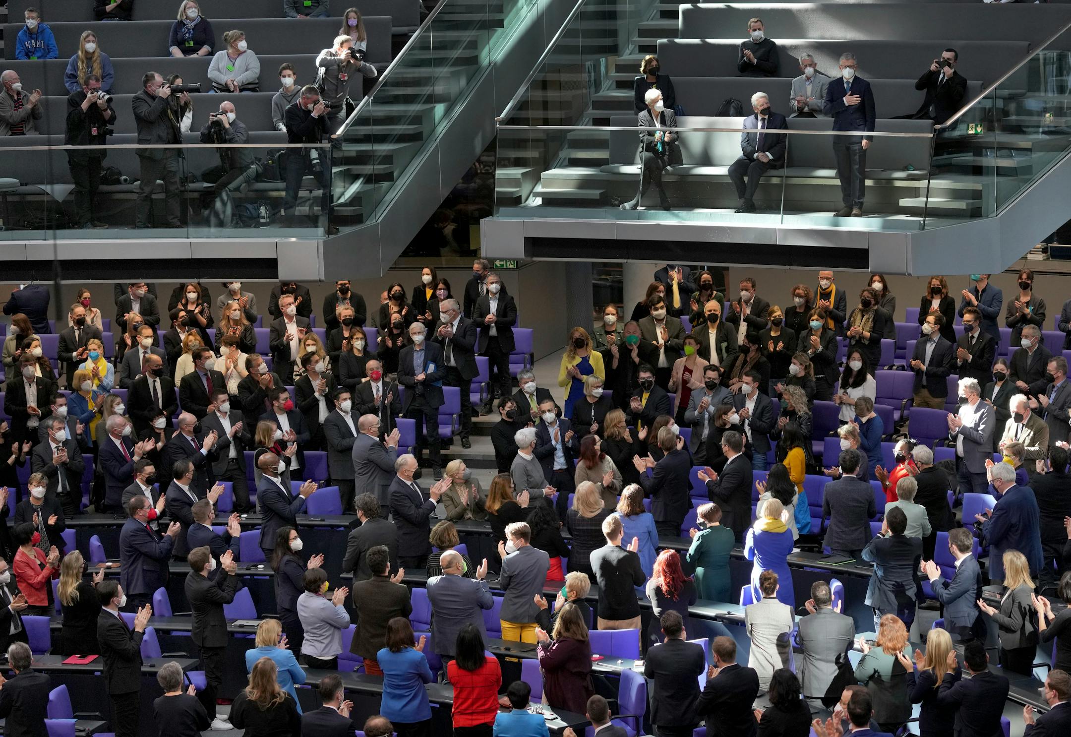 The ambassador of the Ukraine Andrij Melnyk, stands on a visitors tribune, as lawmaker pay their tribute at the beginning of a meeting of the German federal parliament, Bundestag, at the Reichstag building in Berlin, Germany, Sunday, Feb. 27, 2022. (AP Photo/Michael Sohn)