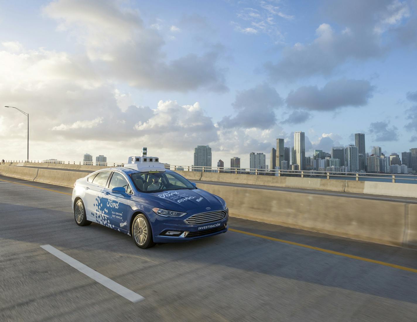 This undated image provided by Ford Motor Co. shows a self-driving vehicle from Ford and Ford partner Argo Al in Miami, Fla. Ford is making Miami-Dade County its new test bed for self-driving vehicles. Argo AI already has a fleet of cars in the area making the highly detailed maps that are necessary for self-driving. Ford also will establish its first-ever autonomous vehicle terminal in Miami, where it will learn how to service and deploy its test fleet. (Ford Motor Co. via AP)