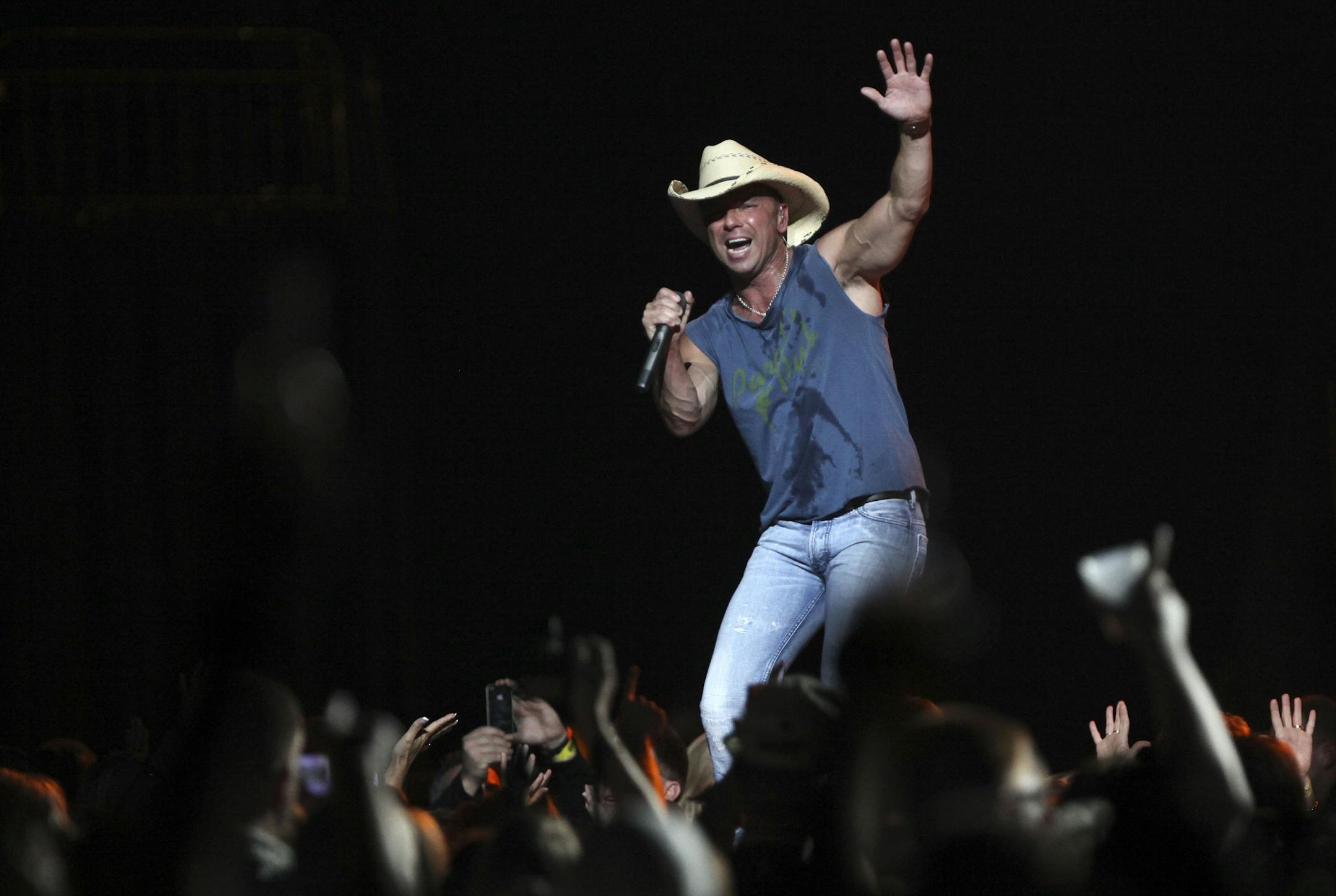 Kenny Chesney performed "Summertime" during his concert at the Xcel Energy Center.