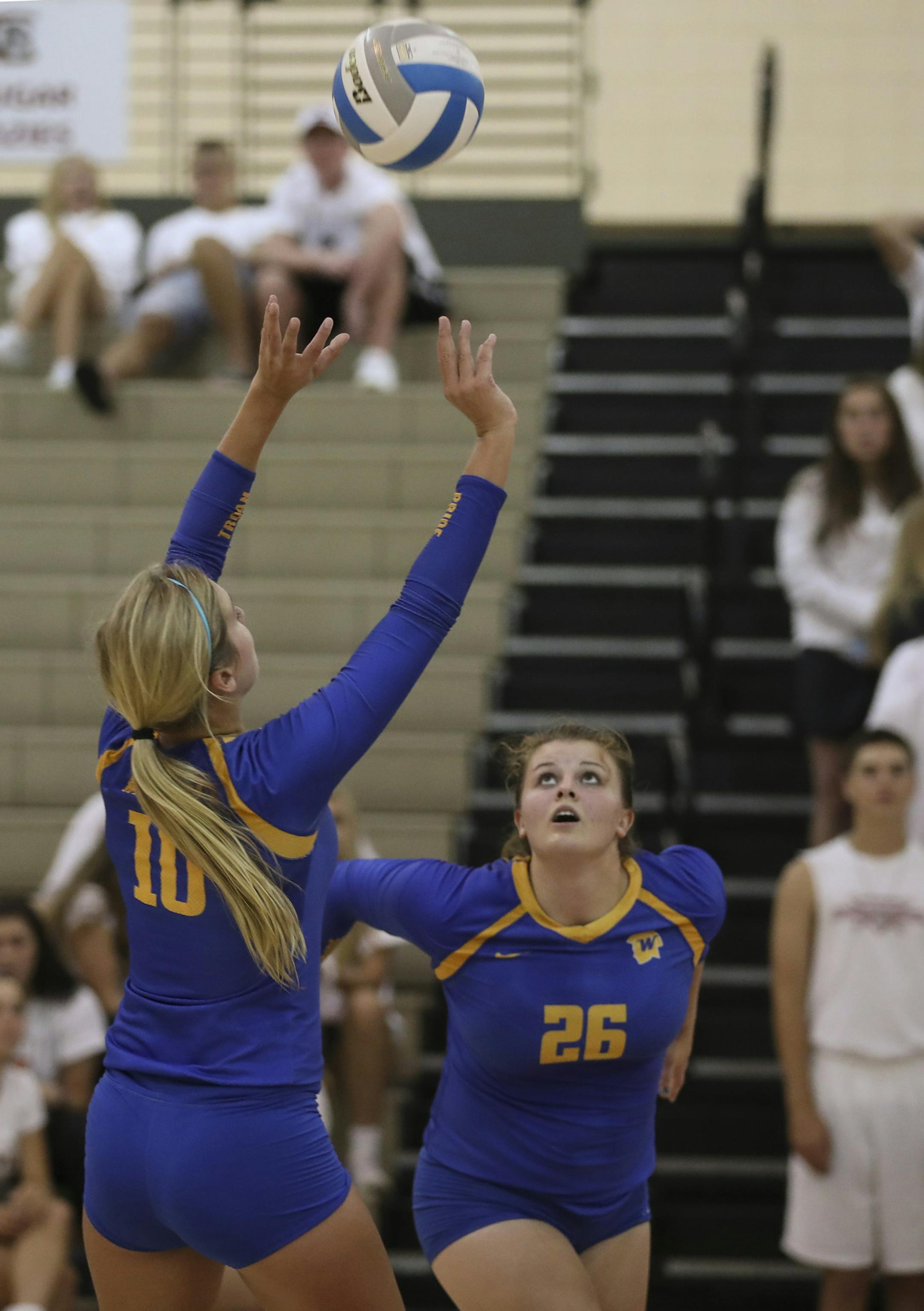 Wayzata senior MacKenzie Groechel (10) set the ball for teammate Morgan Baufield (26) Tuesday night against Lakeville South. ] JEFF WHEELER ï jeff.wheeler@startribune.com Wayzata lost 3-0 to Lakeville South High School in a volleyball match at Lakeville Tuesday night, September 6, 2016.