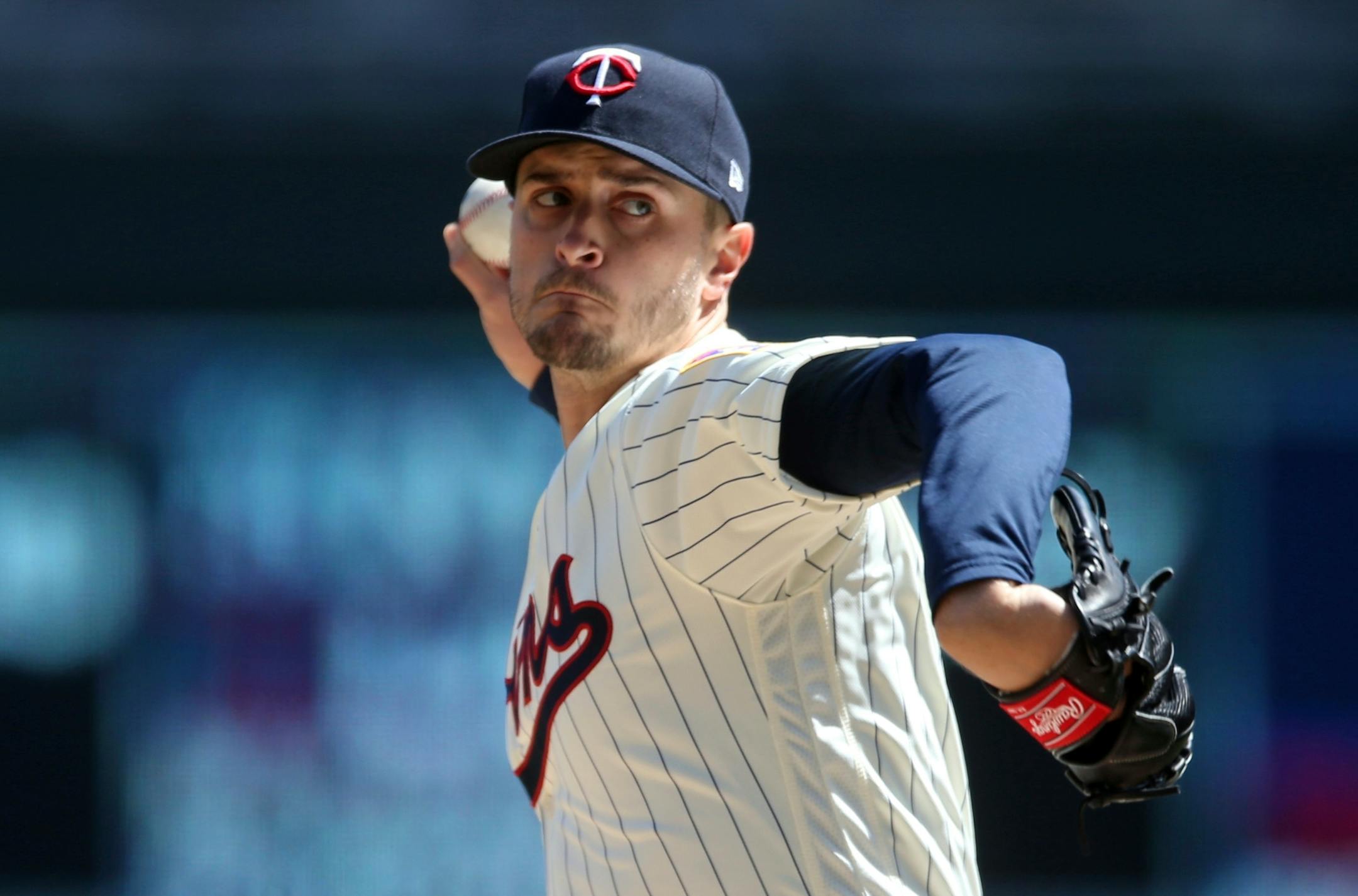 Twins pitcher Jake Odorizzi throws against the Reds in the first inning Saturday