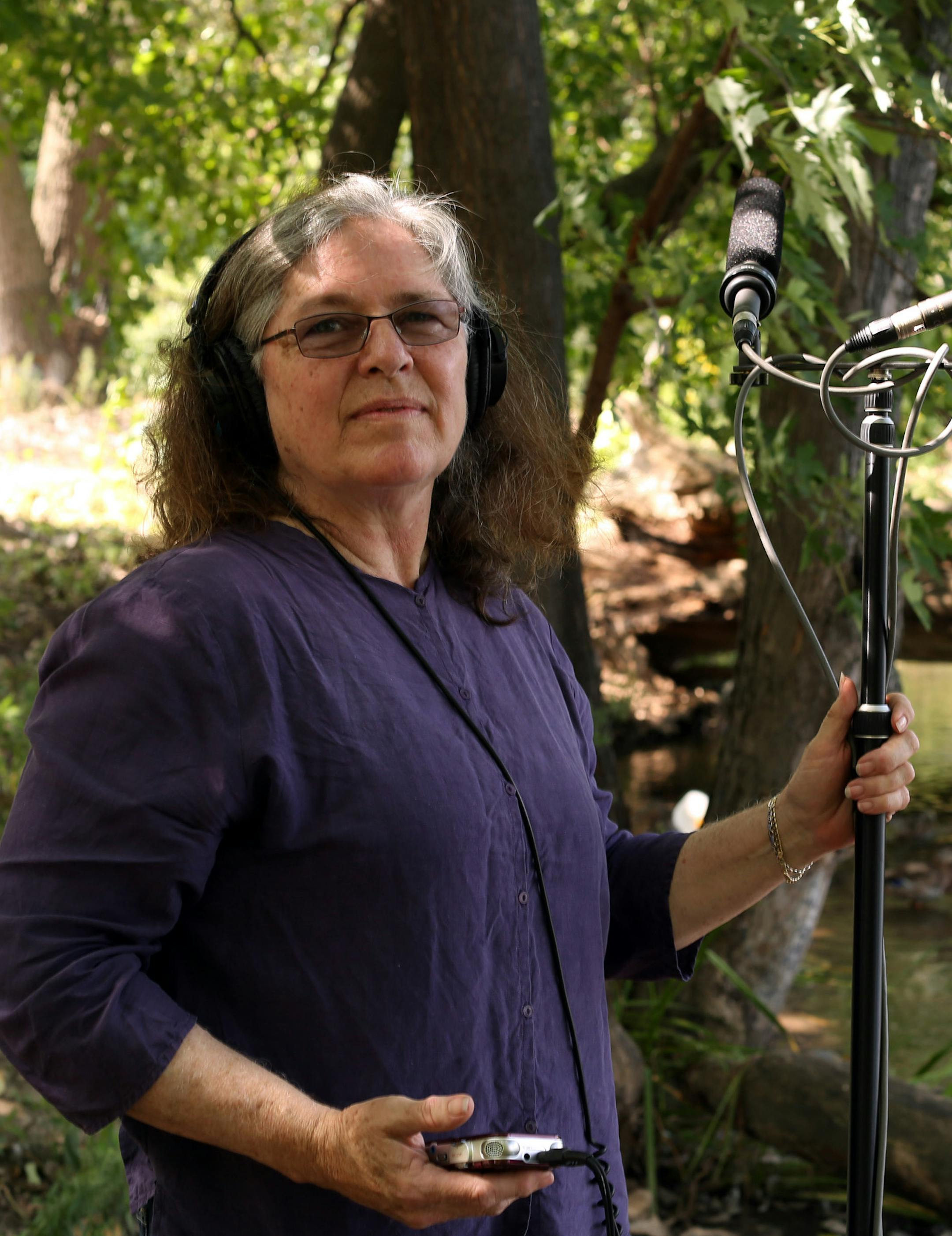 Sound engineer Mary Gaffney has her recording gear set up to record nature sounds outside the Peggy Notebaert Nature Museum in Chicago on Thursday, Sept. 3, 2015. (Phil Velasquez/Chicago Tribune/TNS) ORG XMIT: 1174249