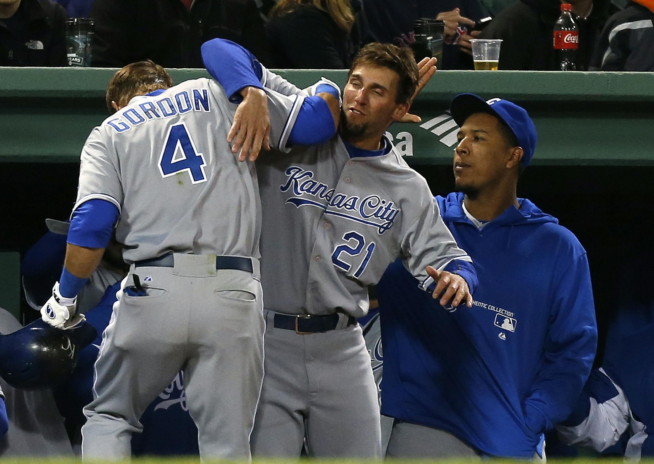 Kansas City Royals' Alex Gordon (4) celebrates his solo home run with teammate Jeff Francoeur in the fifth inning of the second game of a baseball doubleheader against the Boston Red Sox in Boston, Sunday, April 21, 2013. (AP Photo/Michael Dwyer)