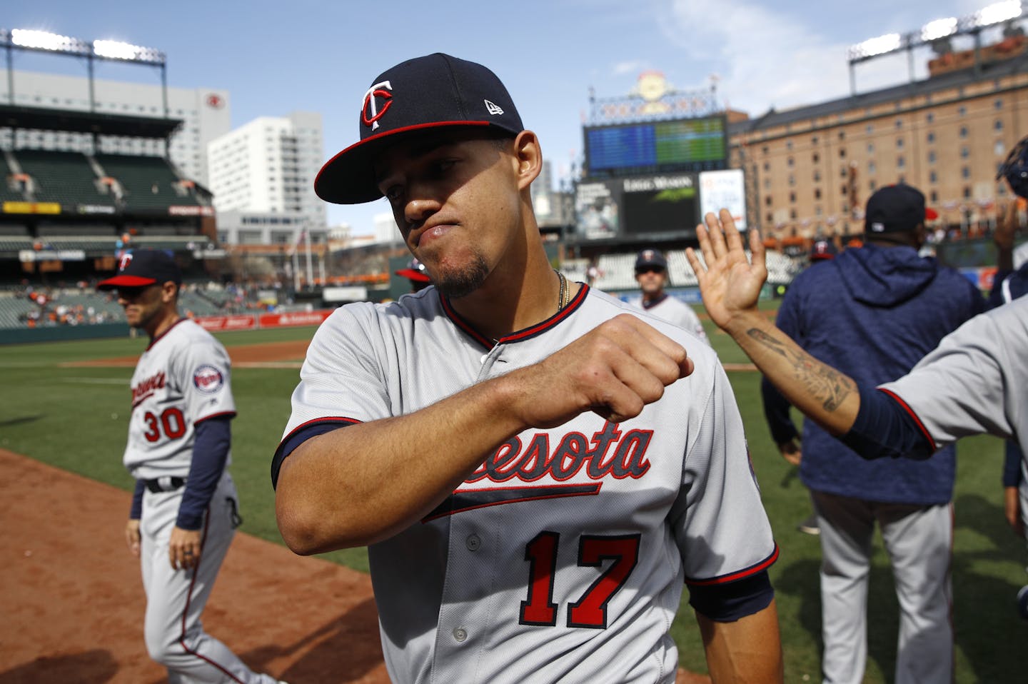 Jose Berrios gestured as he walked off the field after pitching out of a bases-loaded jam in the ninth inning Sunday, finishing off a three-hit shutout.