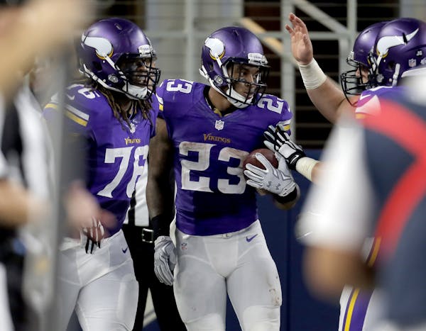 Minnesota Vikings running back Joe Banyard (23) celebrates his touchdown against the Dallas Cowboys during the second half of a preseason NFL football