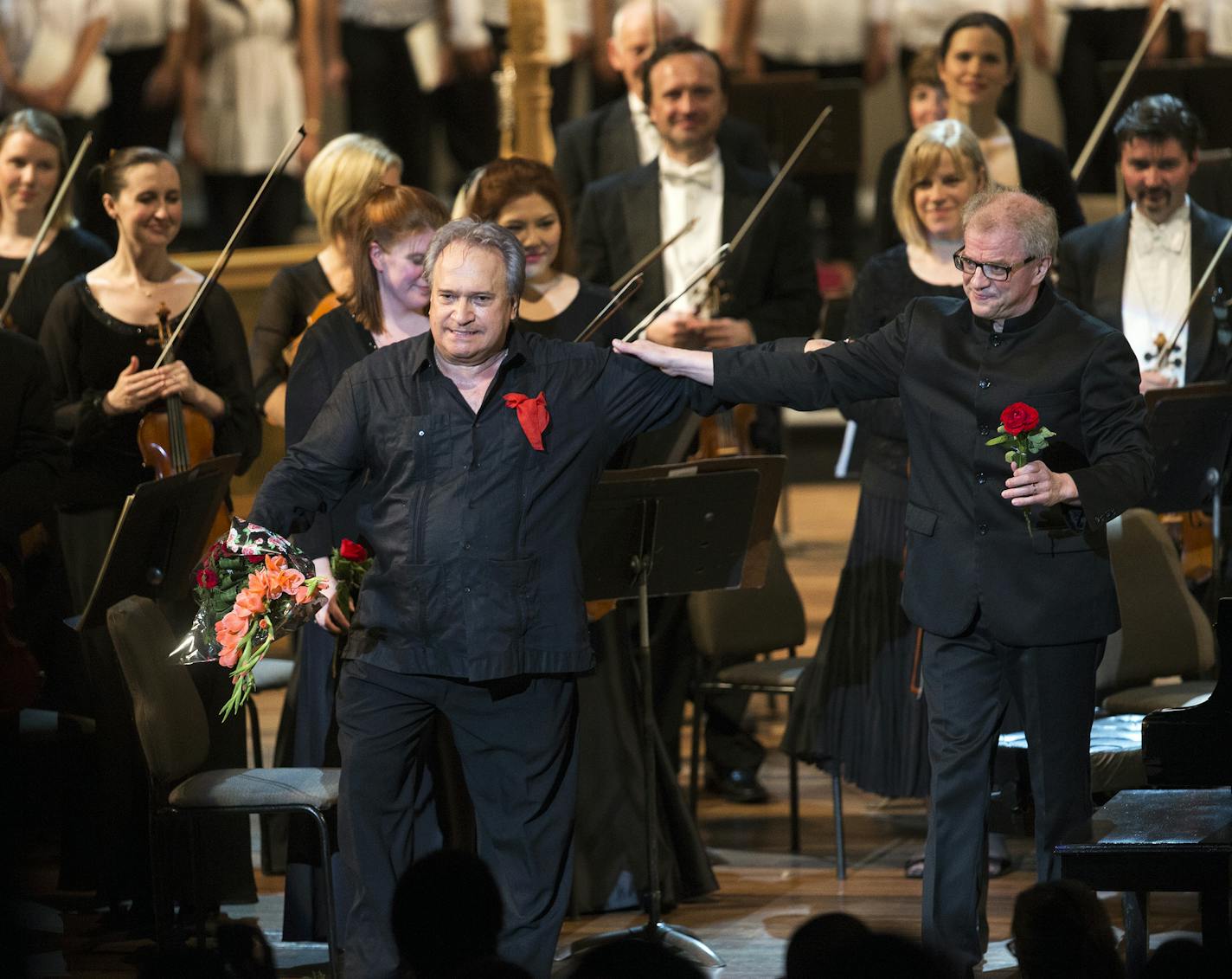 Cuban piano player Frank Fernandez, left, and Minnesota Orchestra music director Osmo Vanska take bows during Minnesota Orchestra's first concert of two at the Teatro Nacional in Havana, Cuba on Friday, May 15, 2015. ]