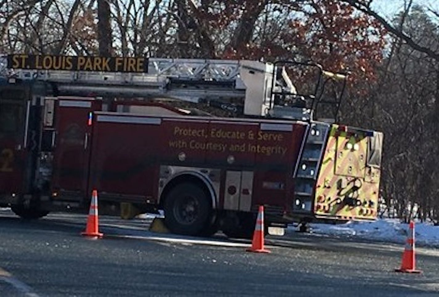 A firetruck was among the emergency vehicles on hand Wednesday outside the Sabes Jewish Community Center.