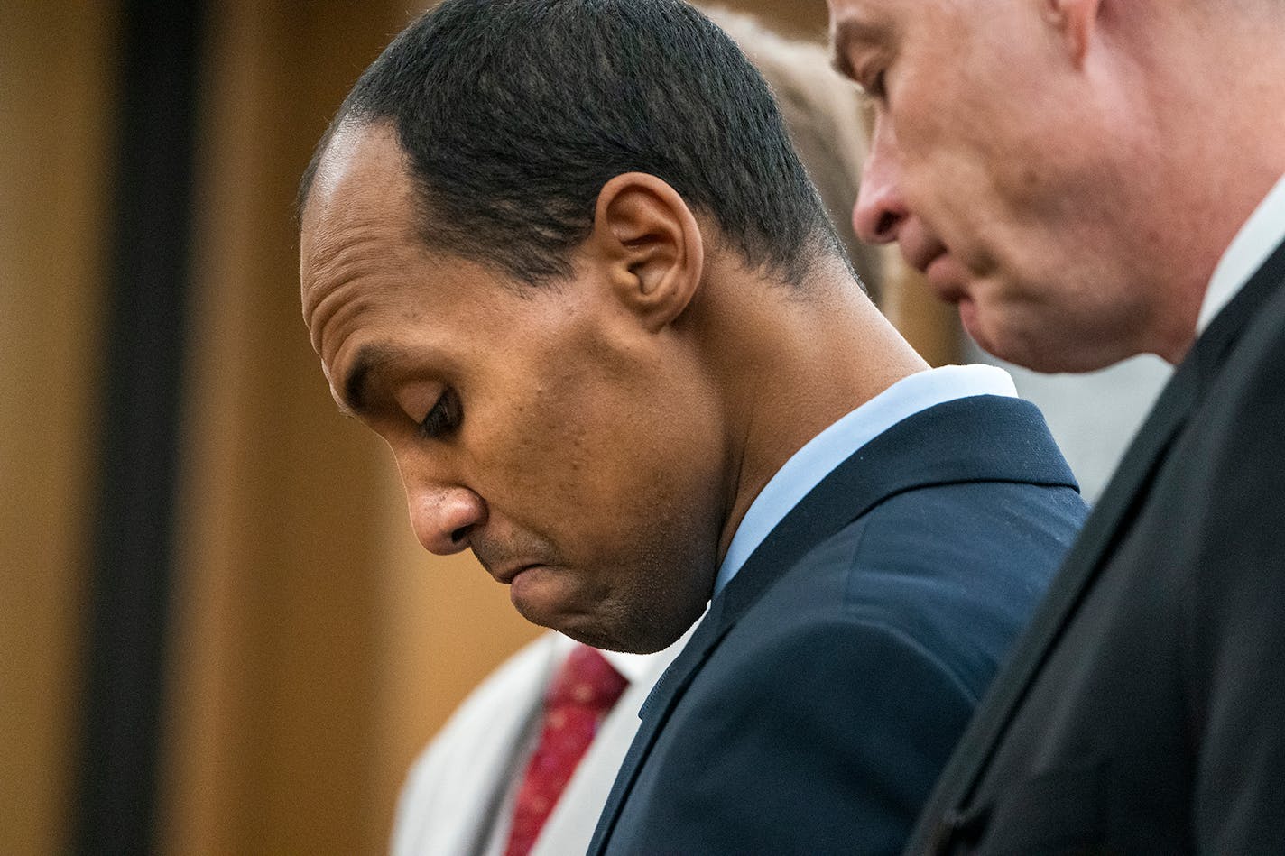 Former Minneapolis police officer Mohamed Noor reads a statement before being sentenced by Judge Kathryn Quaintance in the fatal shooting of Justine Ruszczyk Damond.