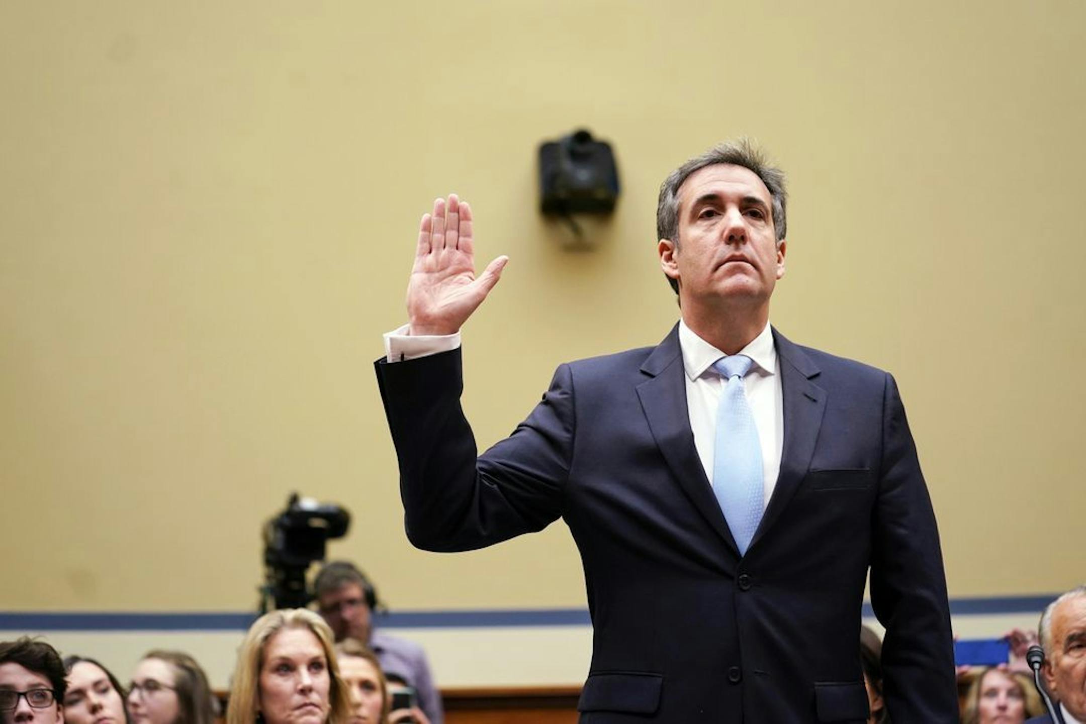 Michael Cohen, President Donald Trump's former personal lawyer, is sworn in to testify before the House Oversight and Reform Committee on Capitol Hill, in Washington, Feb. 27, 2019.