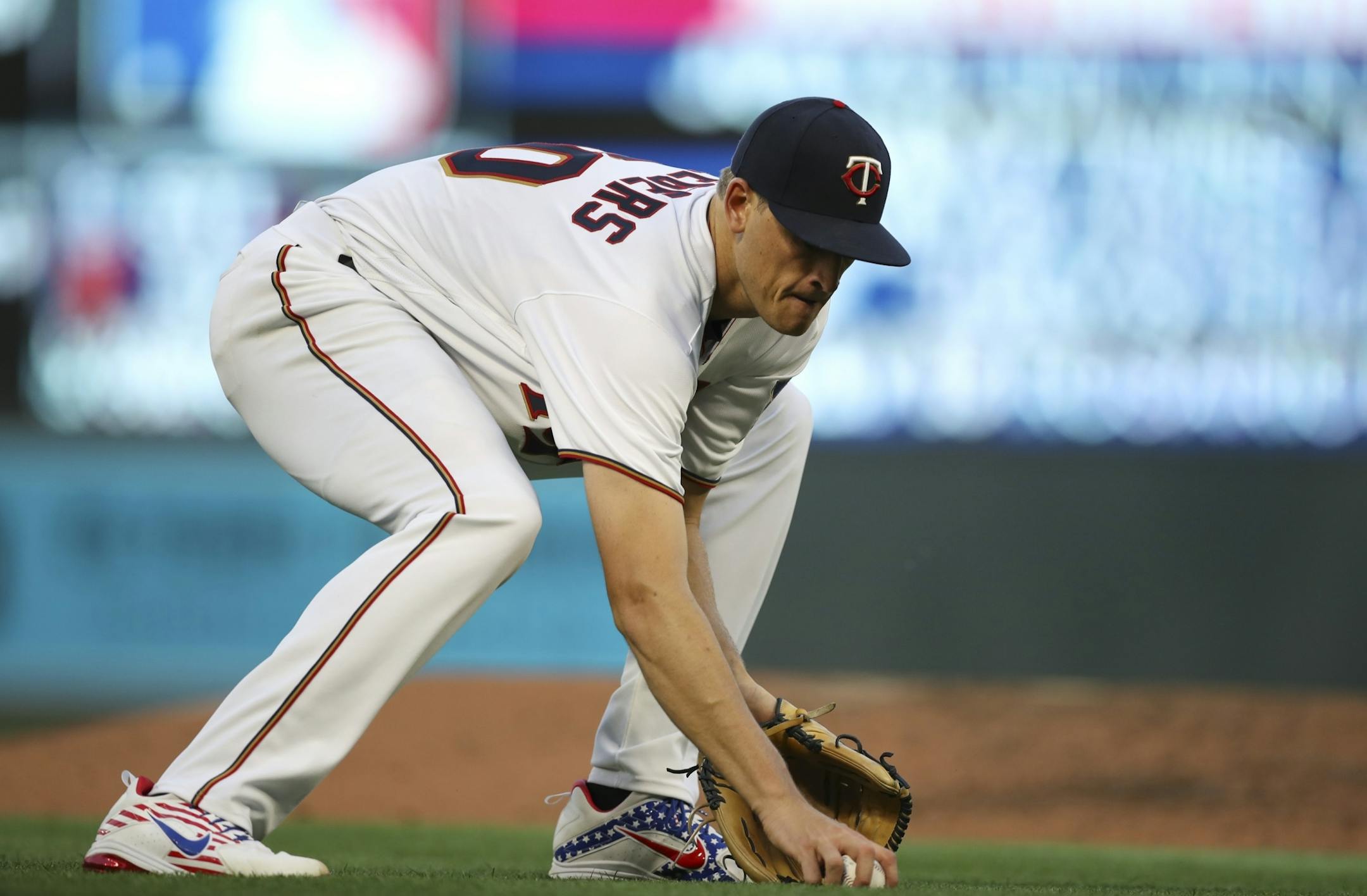 Minnesota Twins starting pitcher Aaron Slegers fielded a grounder hit by Orioles shortstop Manny Machado for a sixth inning out. Slegers notched his first major league win.