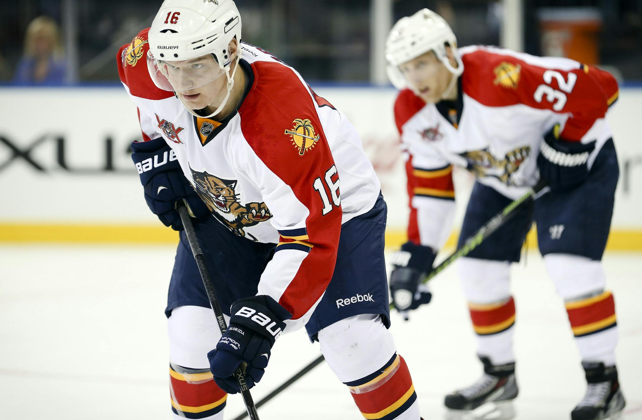 Florida Panthers center Aleksander Barkov (16) and right wing Kris Versteeg (32) prepare for a face off in the second period of an NHL hockey game against the New York Rangers at Madison Square Garden, Sunday, Nov. 10, 2013, in New York. The New York Rangers won 4-3. (AP Photo/John Minchillo) ORG XMIT: MIN2013111520211993