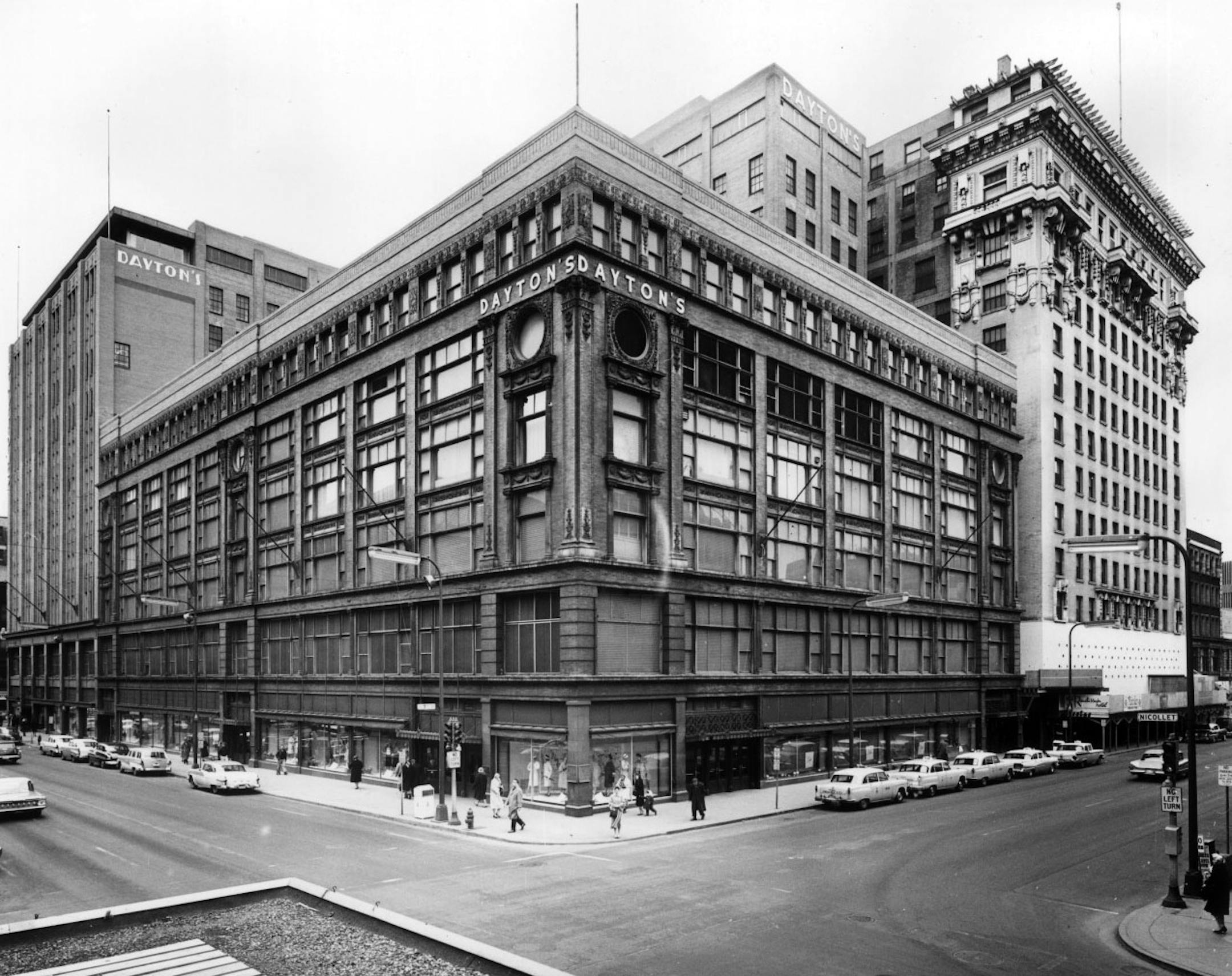 Dayton's department store, Seventh Street and Nicollet Avenue South (now Nicollet Mall), in Minneapolis. Radisson Hotel is shown at right, on Seventh Street // from the Minneapolis - Buildings - Central Loop folder of the 1960 Minneapolis Special Survey Drawer // Photo by Minneapolis Star and Tribune staff photographer Roy Swan, March 1960.