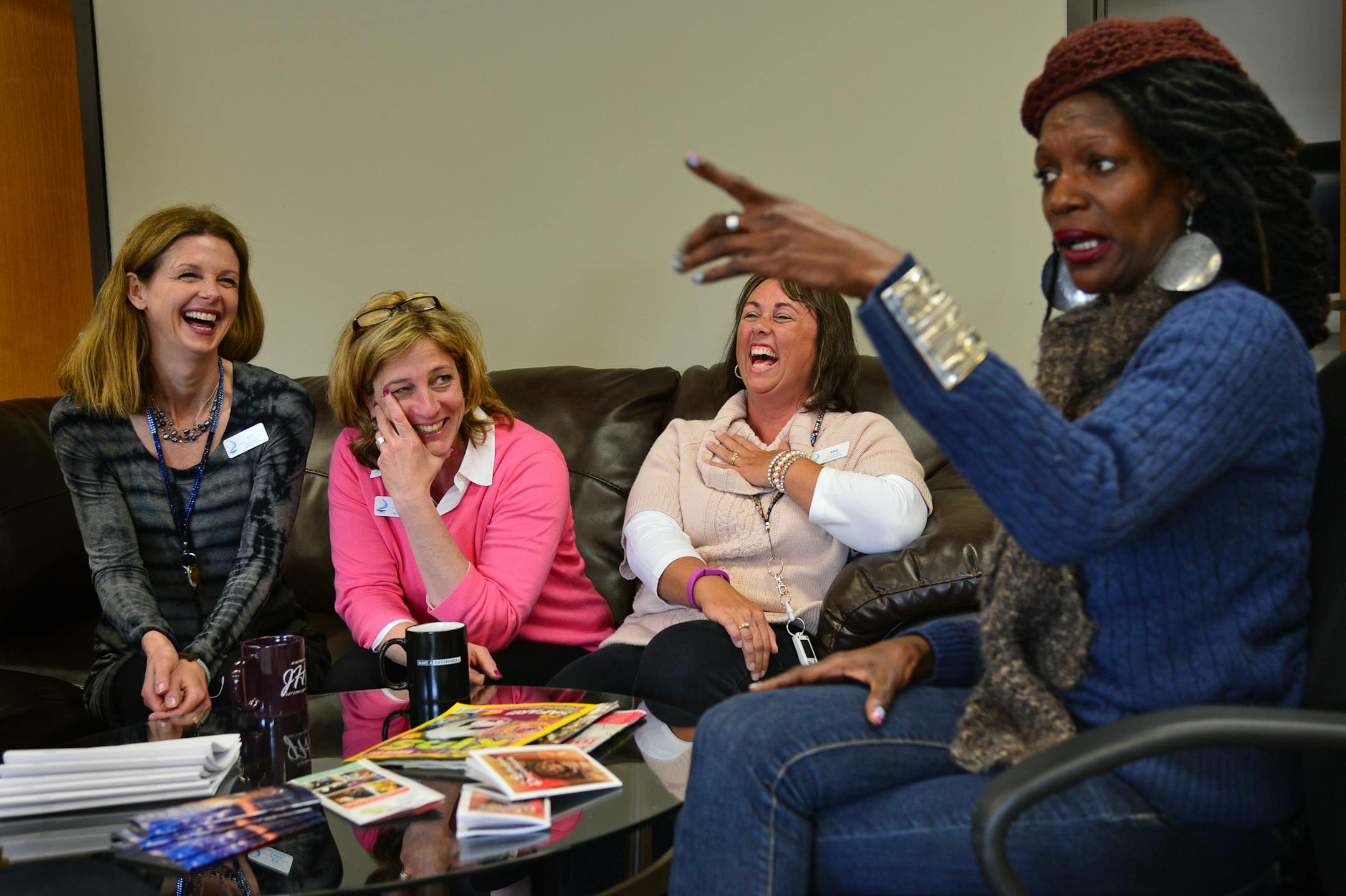 Nefertari Hayes 41 years old recently moved to Minnesota. she has been using the resource center at St. Andrews Lutheran Church to look for jobs . In a very humorous way she recounted her struggles with homelessness while Beth Smith Program Support Volunteer, Liz Schreier Community Resource Director and Kris Mason Community Resource Director all laughing in support while listening to her tales of hardship and then finding shelter and relief at St. Andrews Lutheran Church. They were all laughing