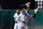 Minnesota Twins' Byron Buxton reacts after hitting a two-run double against the Oakland Athletics on Sunday.