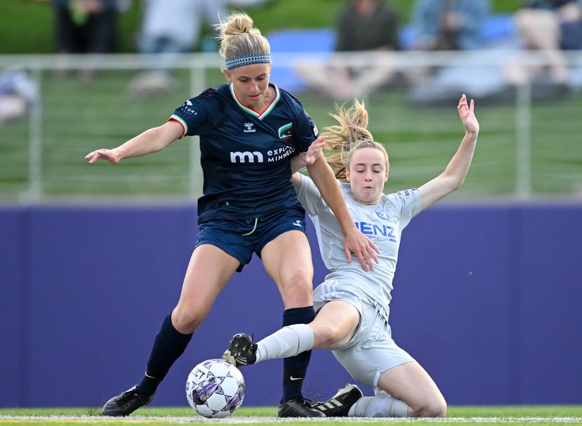 Minnesota Aurora midfielder Addison Weichers worked to keep possession against Rochester FC defender Abbie Rutledge when the teams met May 24 at TCO S