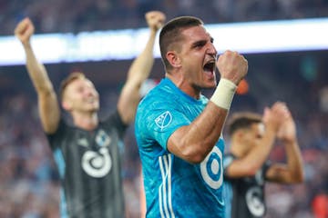 Vito Mannone (1) celebrates with his team after a 1-0 win over FC Dallas. Mannone made a game winning penalty kick save in stoppage time. ALEX KORMANN