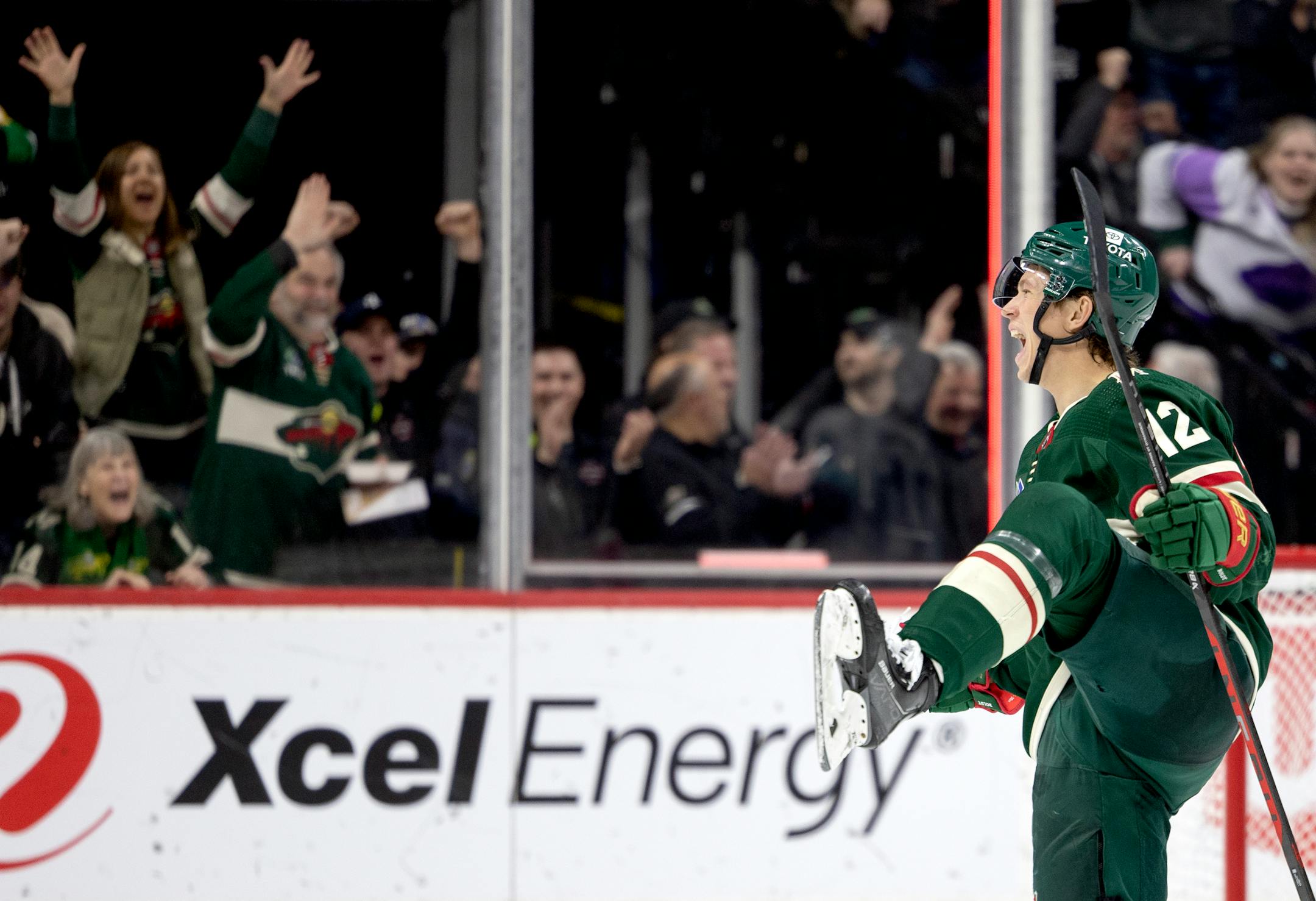 Matt Boldy (12) of the Minnesota Wild celebrates after scoring a goal in the second period.