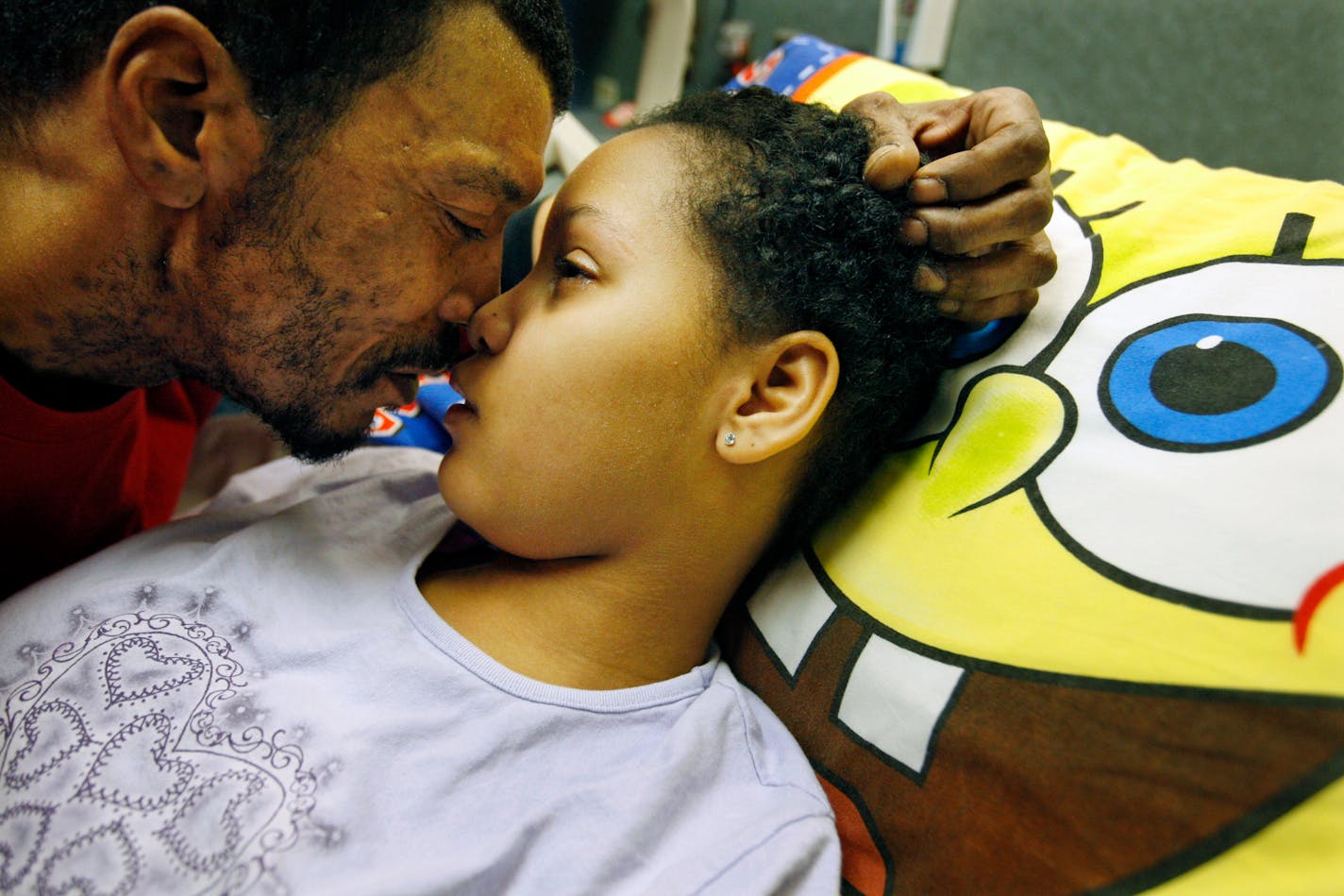 At Gillette Children's Specialty Healthcare in St. Paul, Steve Hall nuzzled and whispered sweetly to his daughter, Vernice. She was finally heading home after 112 days in the hospital. The 12-year-old girl was shot just steps outside a party at her north Minneapolis home.