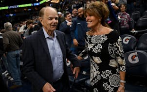 Glen Taylor and his wife, Becky, walk off the court after the Timberwolves defeated the Mavericks earlier this season. Taylor is remaining as majority