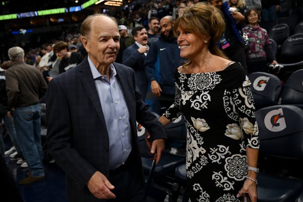 Glen Taylor and his wife, Becky, walk off the court after the Timberwolves defeated the Mavericks earlier this season. Taylor is remaining as majority