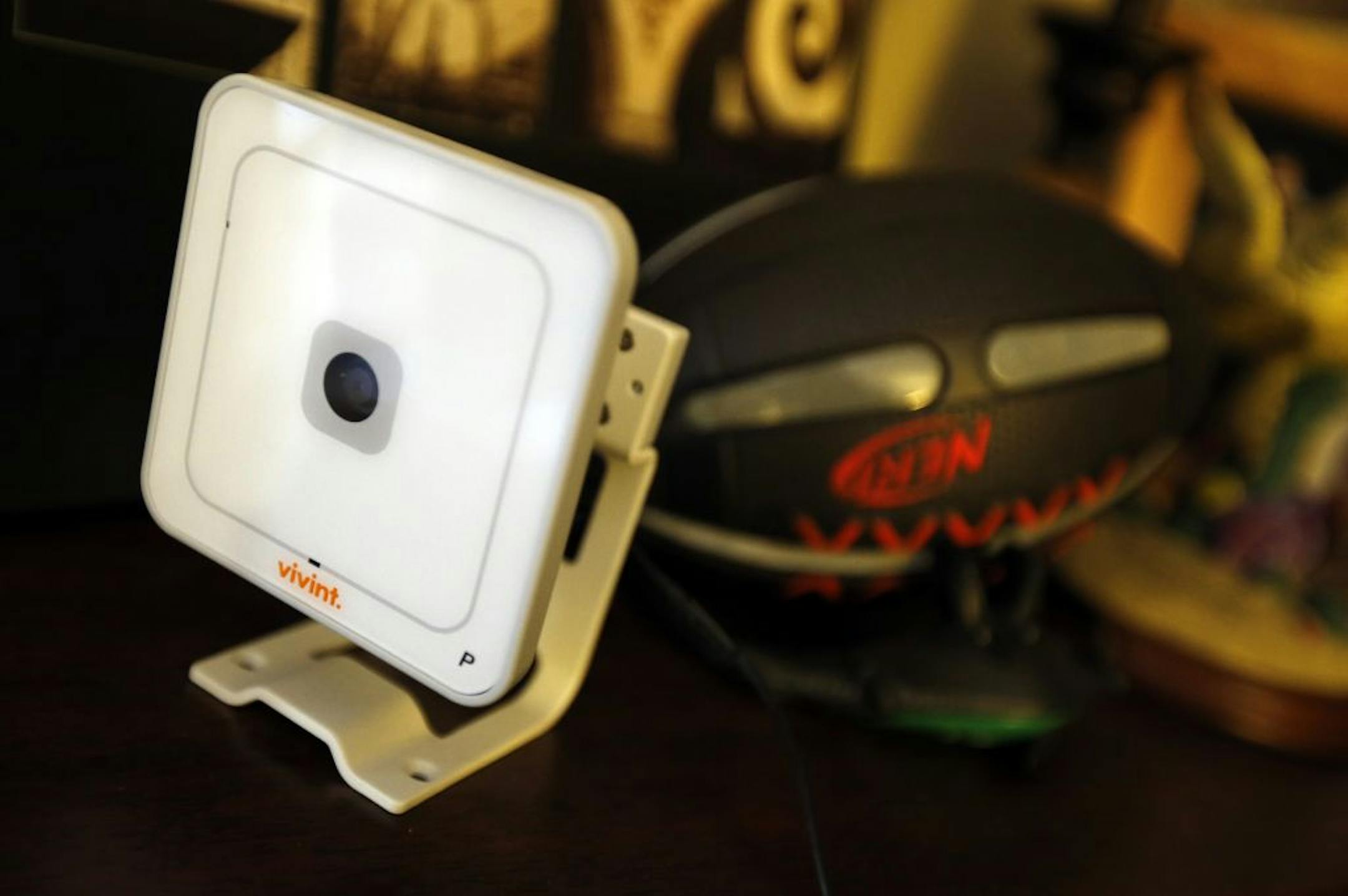 A security camera currently set up on a book shelf can be mounted anywhere around the home and viewed remotely from computer or smartphone.