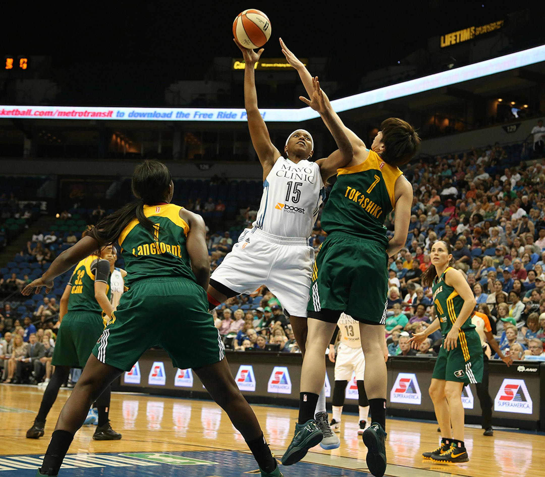 Lynx Asjha Jones went up for a mid range jumper against Seattle's Ramu Tokashiki during the first half.