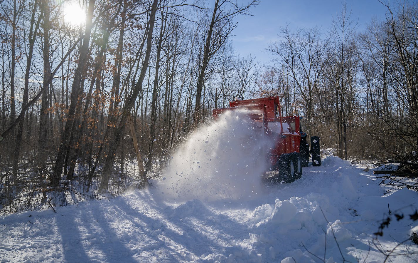 Lead volunteer Don Olson's son Eric Olson used a manure spreader to place man-made snow on trails for grooming at Vasoloppet Nordic Ski Center, Thursday, January 10, 2019 in Mora, MN. The Center is run purely by volunteers and donations. ] ELIZABETH FLORES &#x2022; liz.flores@startribune.com