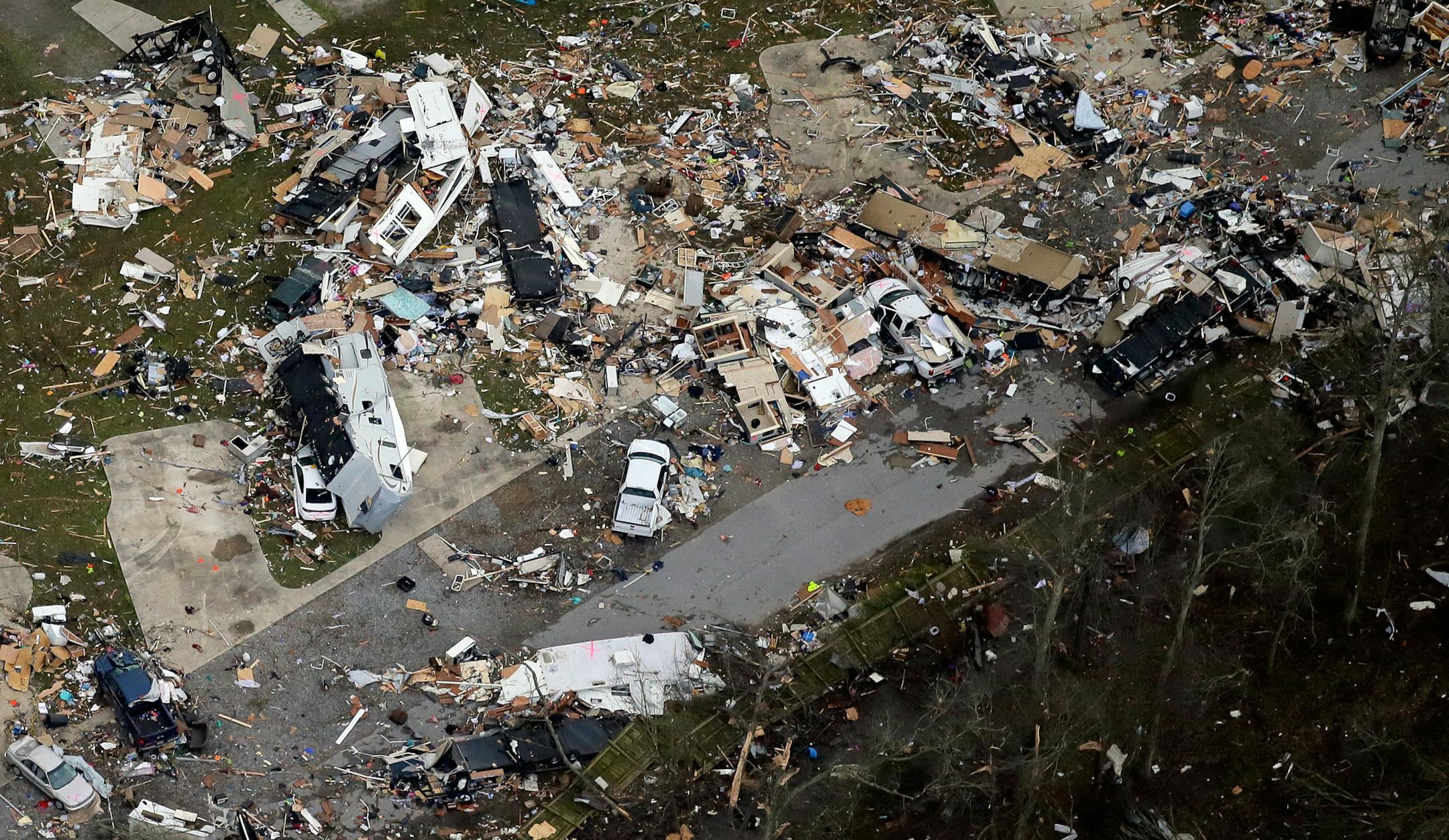 This aerial photo shows damage after a tornado ripped through the Sugar Hill Recreational Park in the town of Convent, in southern La., Wednesday, Feb. 24, 2016. Tornadoes ripped through the RV park in Louisiana and significantly damaged nearly 100 homes and apartments in Florida as a deadly storm system rolled across the South, and forecasters warned that more twisters were possible Wednesday along the East Coast. (David Grunfeld /NOLA.com The Times-Picayune via AP) MAGS OUT; NO SALES; USA TODA