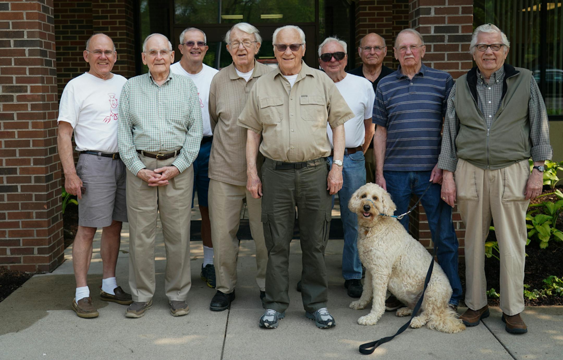 The 'Friday Boys' of Bethlehem Lutheran Church in Minnetonka (from left) Sandy Erickson, Glen Hohenstein, Phil Brusius, Knute Gilbertson, Ed Sorebo, George Klacan, Lee Martinsen, Wayne Engelman, Dave Ringstad, and honorary canine member, Abby Engelman. ] Shari L. Gross &#xa5; shari.gross@startribune.com The "Friday Boys," a group of senior men who have been gathering at their church to do chores every Friday morning for years (although they've mostly turned into a Friday-morning coffee gathering