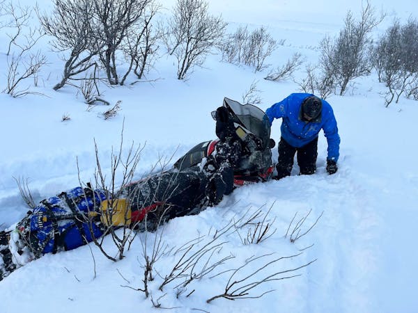 Paul Dick, 72, Rex Hibbert, 70, and Rob Hallstrom, 65, left Minnesota March 6 for Fairbanks, Alaska, by snowmobile. They’re currently stuck in the v