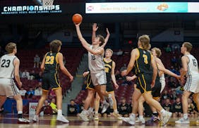 Dilworth-Glyndon-Felton’s Owen Leach worked the lane Tuesday against Plainview-Elgin-Millville during their state quarterfinal game.