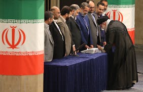 Iran's supreme leader Ayatollah Ali Khamenei arrives to cast his vote during the runoff presidential election in Tehran on Friday, June 28, 2024. Iran